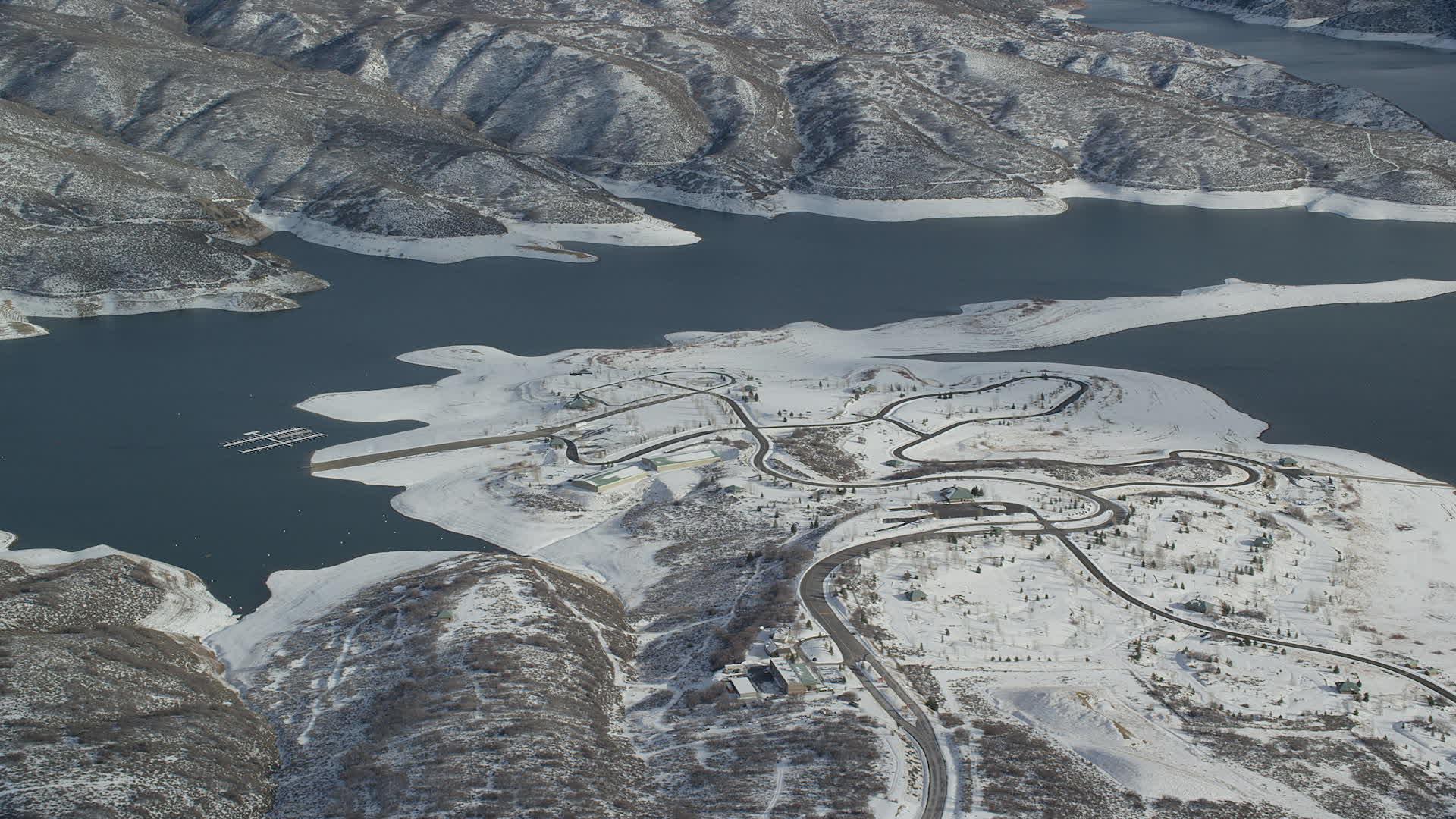 5.5K stock footage aerial video orbit roads on the shore of the Jordanelle Reservoir in