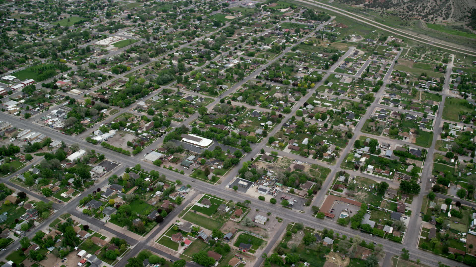 5.5K stock footage aerial video of orbiting neighborhoods in a small