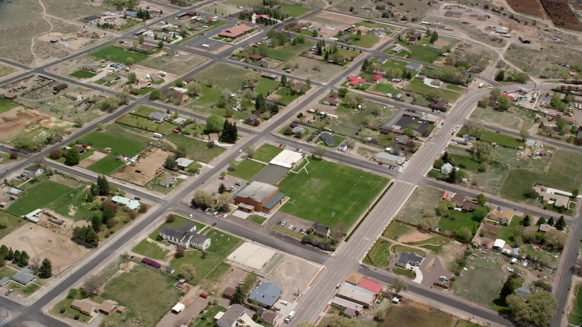 5.5K stock footage aerial video of orbiting Wayne High School in small