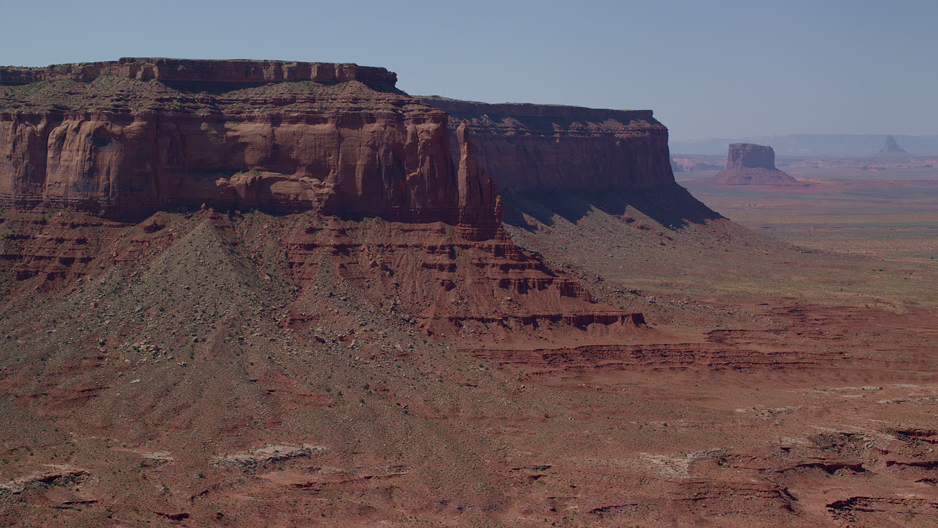 5.5K stock footage aerial video of a reverse view of Eagle Rock Butte by Eagle Mesa, Monument