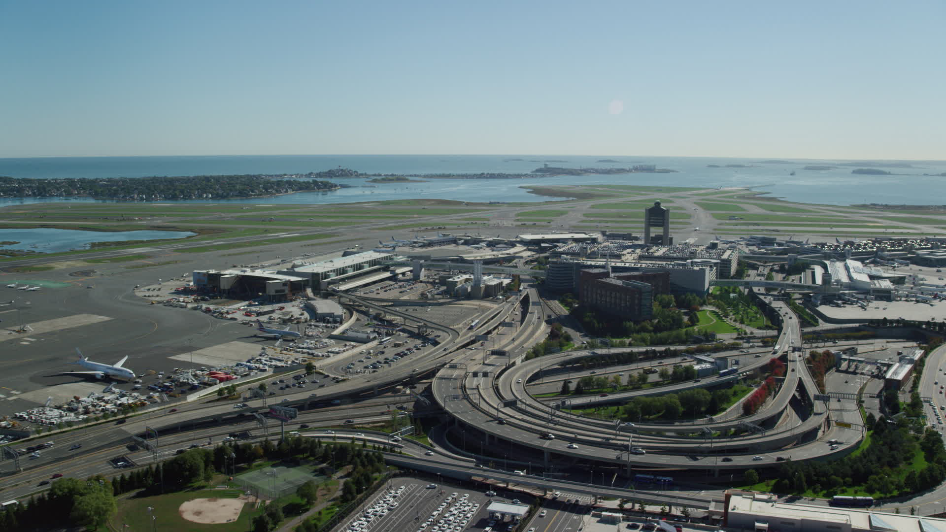5.5K stock footage aerial video approaching Logan International Airport