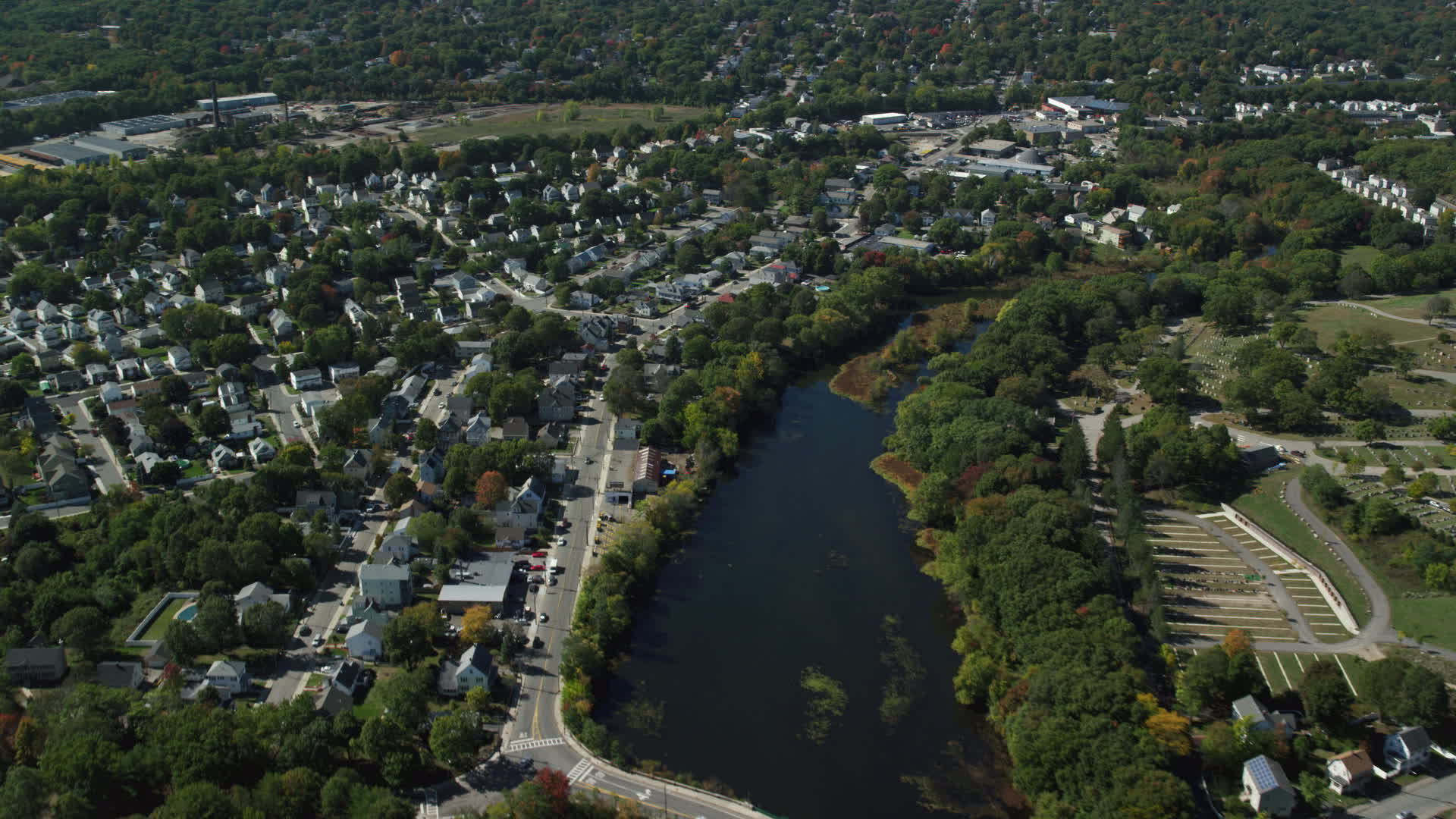 5.5K stock footage aerial video flying over small town neighborhoods, Mill Pond, Hyde Park
