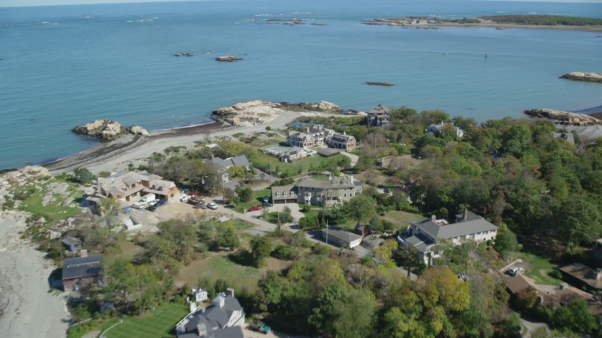 5.5K stock footage aerial video flying over upscale oceanfront homes