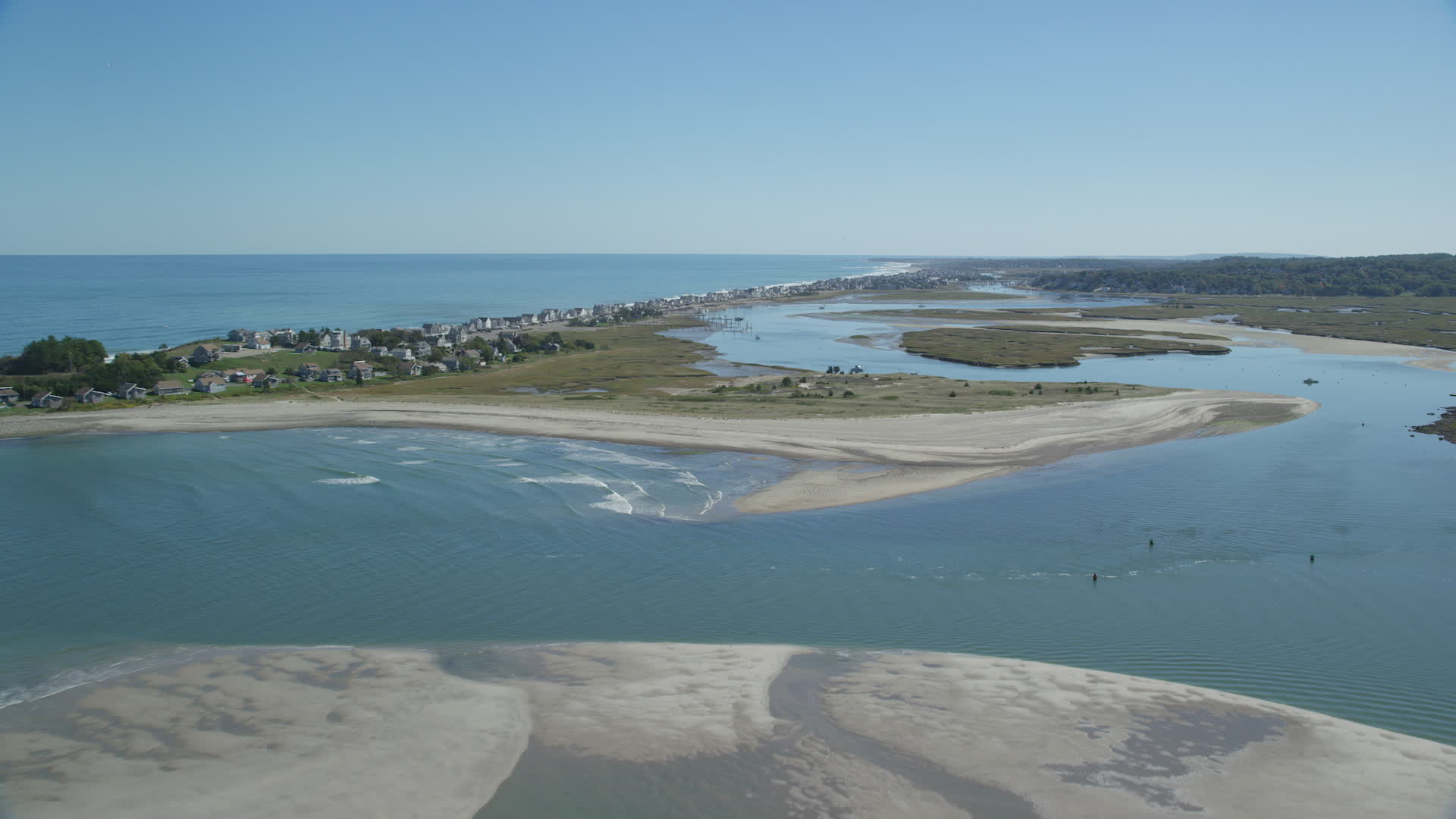5.5K stock footage aerial video flying by coastal homes and over New