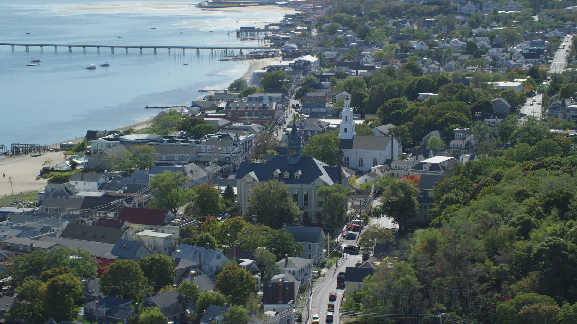 6K stock footage aerial video of Provincetown Town Hall, Unitarian