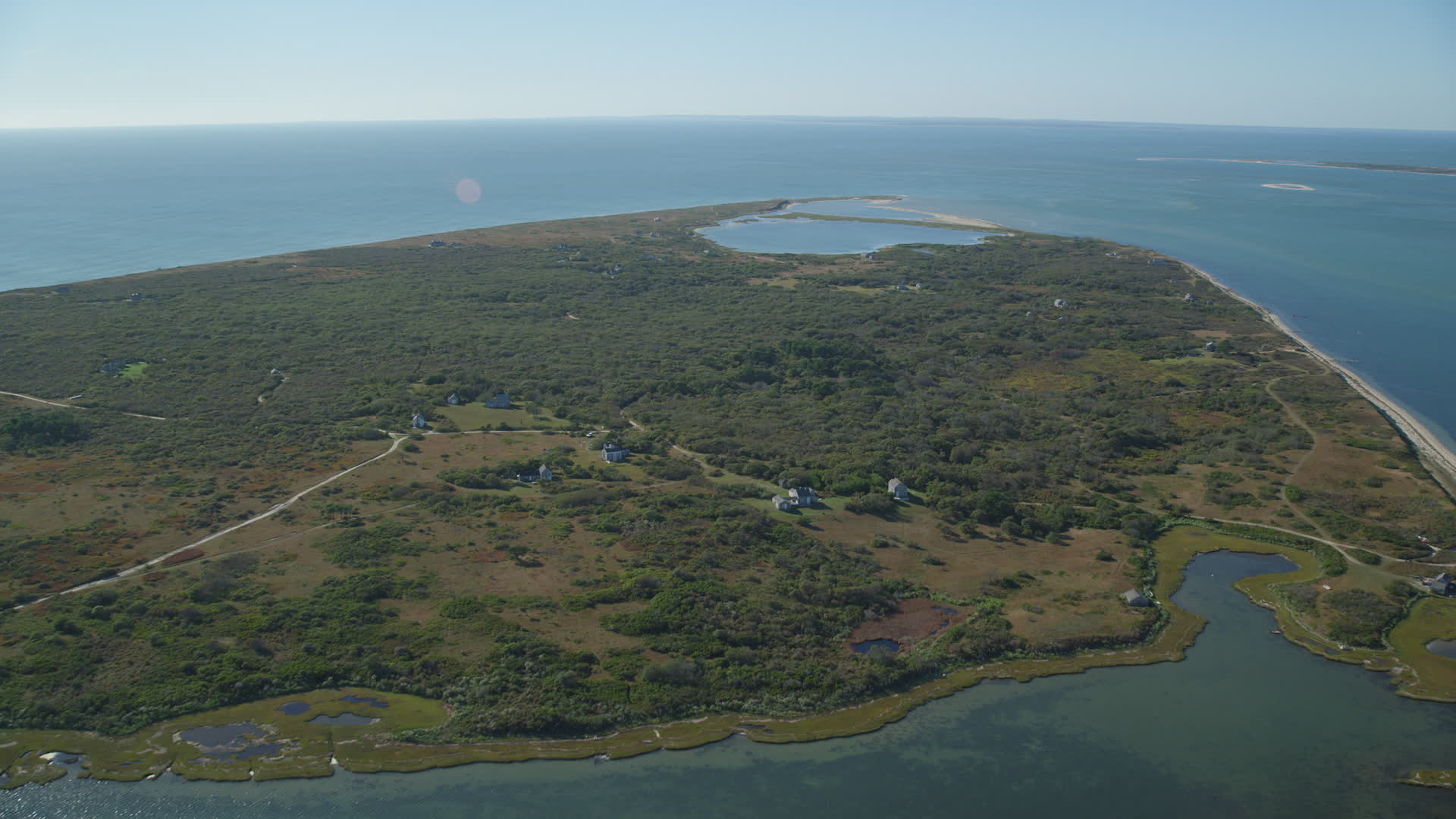 5.5K stock footage aerial video approaching homes on Tuckernuck Island
