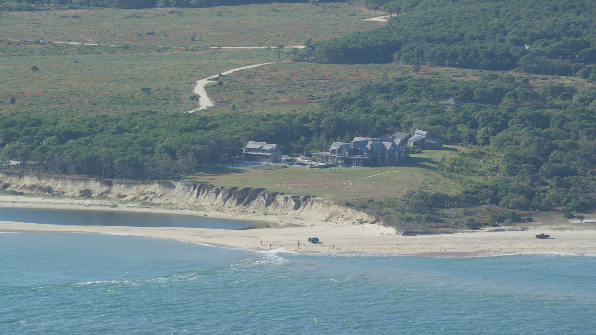 6K stock footage aerial video of an isolated beachfront ...
