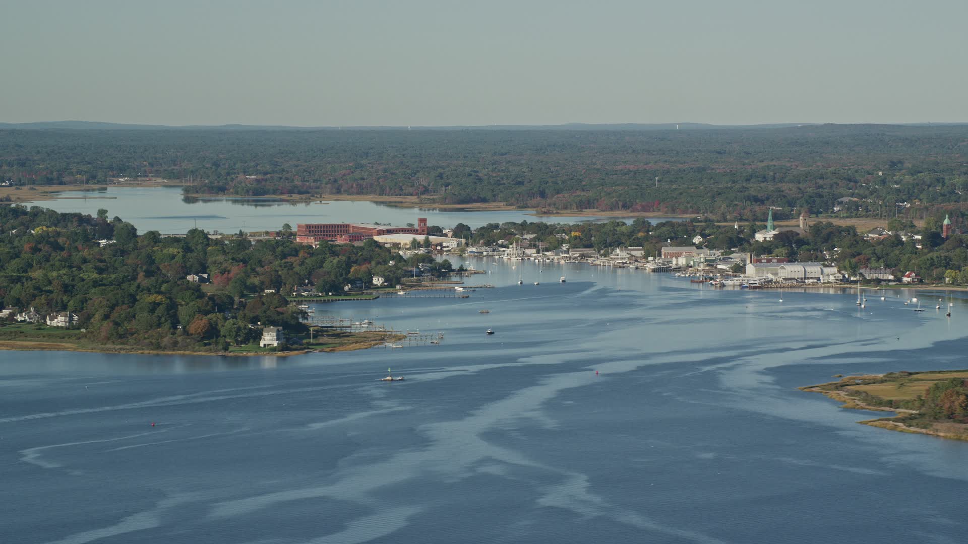 6k stock footage aerial video flying by small coastal town, waterfront homes, Warren, Rhode