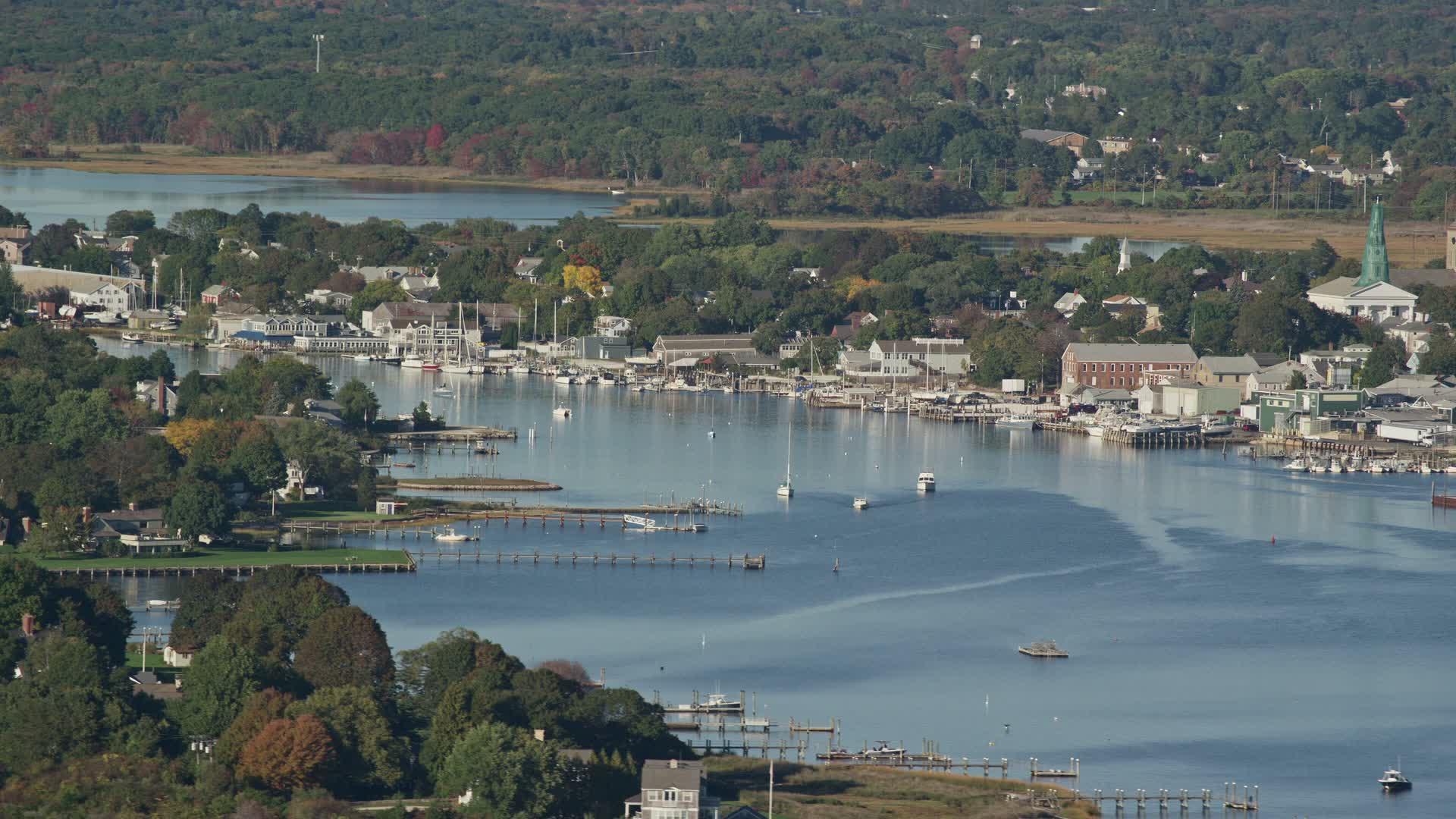 6k stock footage aerial video flying by small coastal town, waterfront
