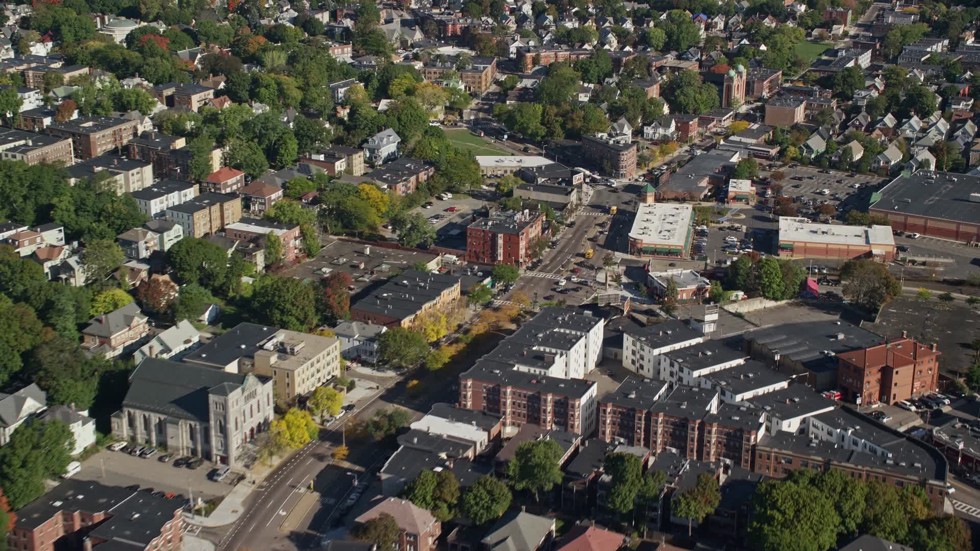 6k stock footage aerial video flying over a city street and apartment buildings, Dorchester