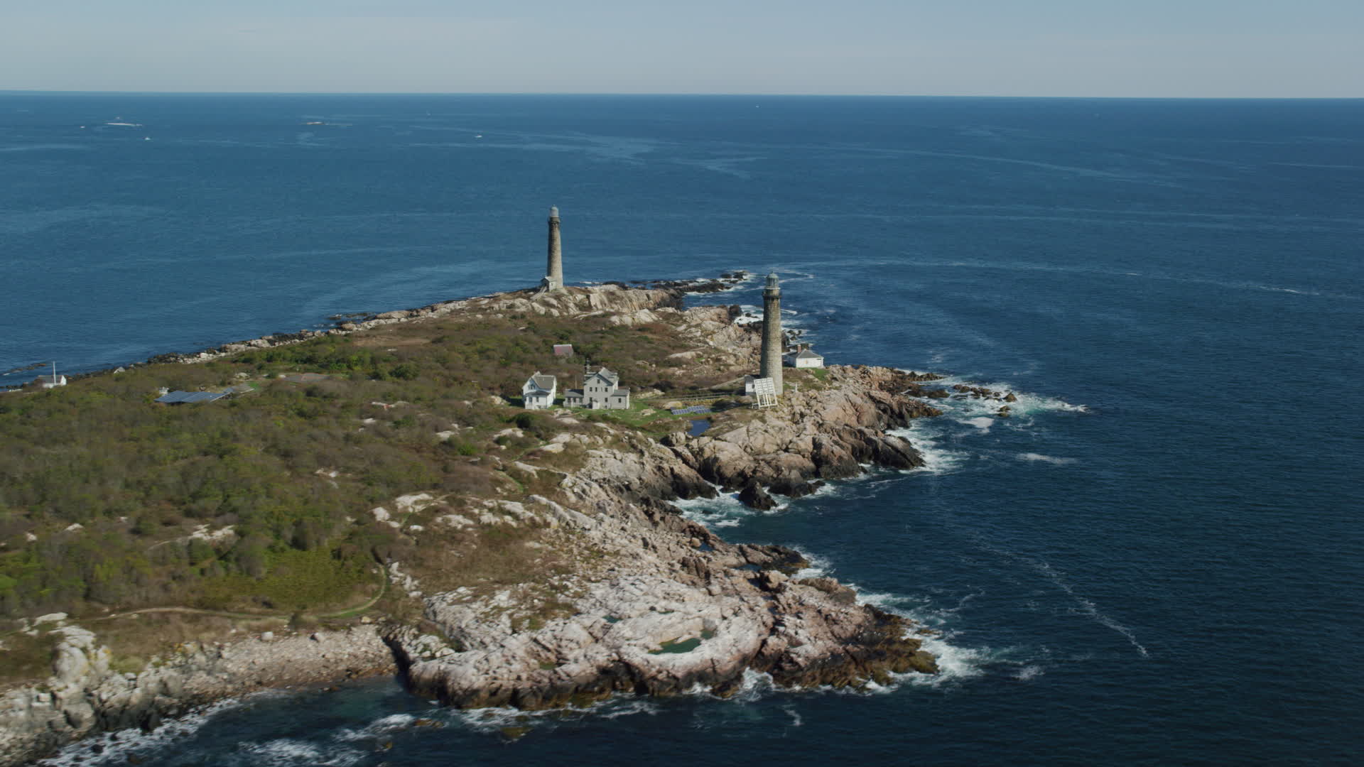 6k stock footage aerial video approaching two lighthouses on an island