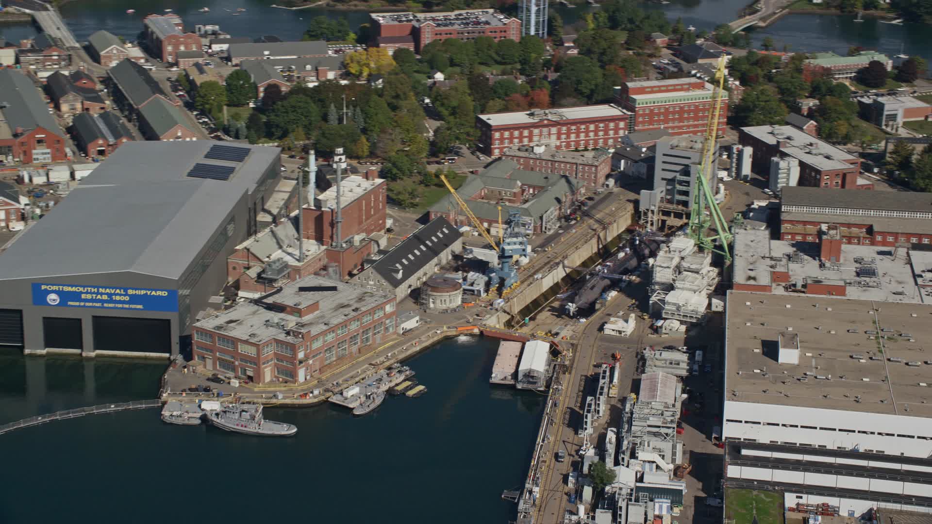 6k stock footage aerial video flying by Portsmouth Naval Shipyard