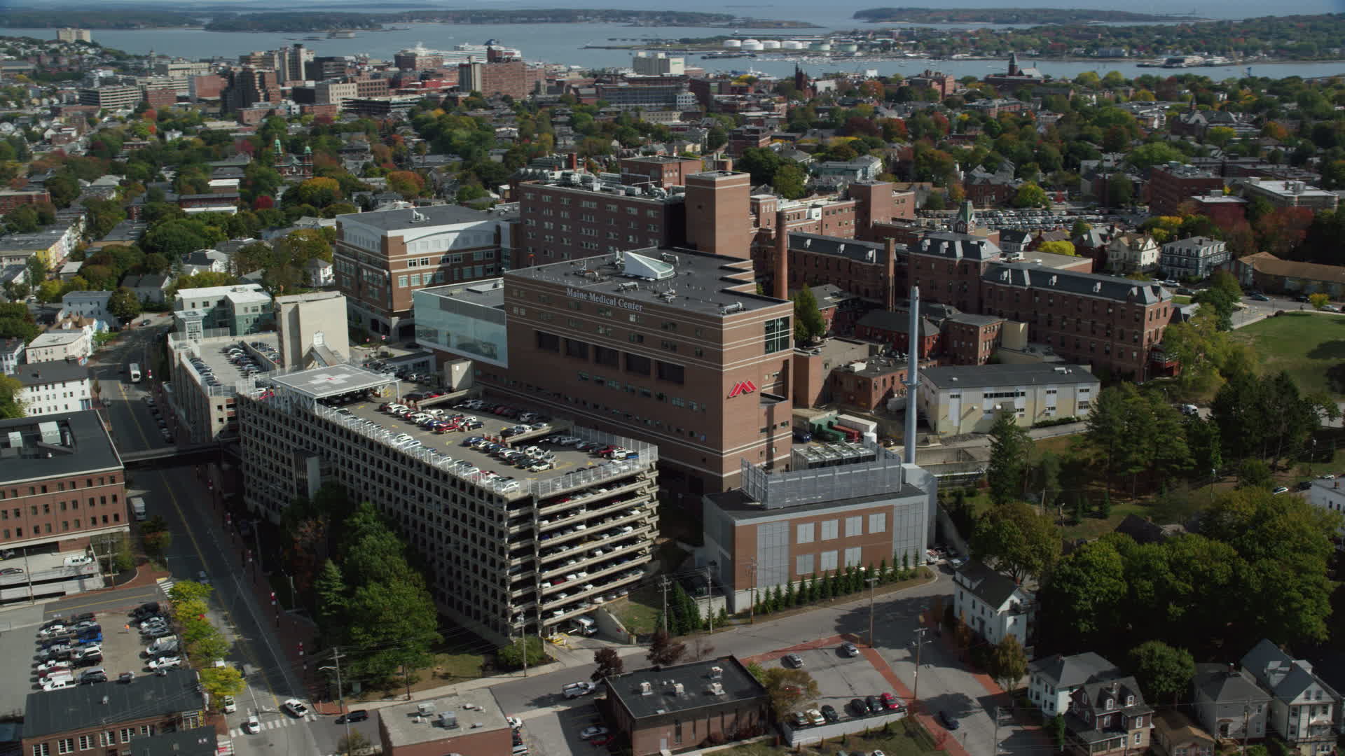 6k stock footage aerial video orbiting the Maine Medical Center, autumn