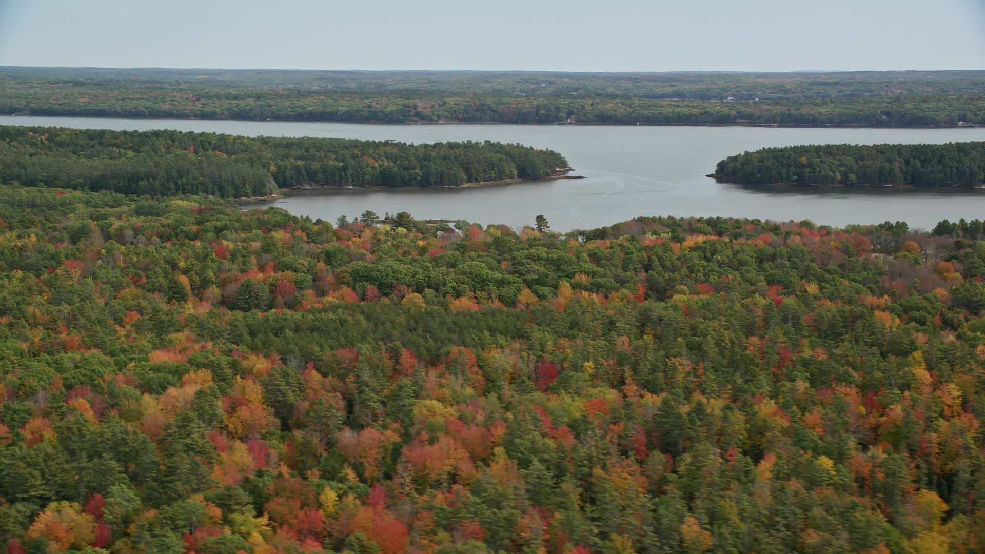 6k stock footage aerial video flying by Montsweag Bay, colorful forest, autumn, Woolwich, Maine