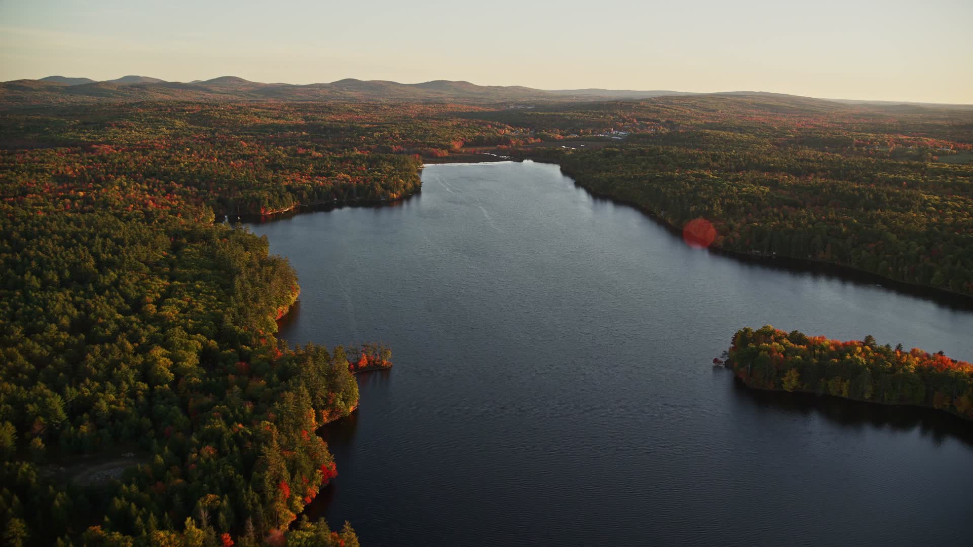 5.5K stock footage aerial video flying over Quantabacook Lake, forest