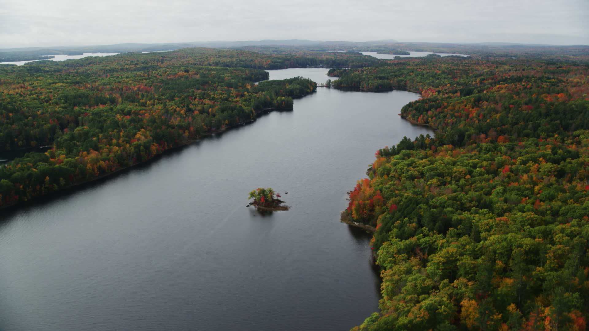 5.5K stock footage aerial video flying by Upper Narrows Pond, forest of