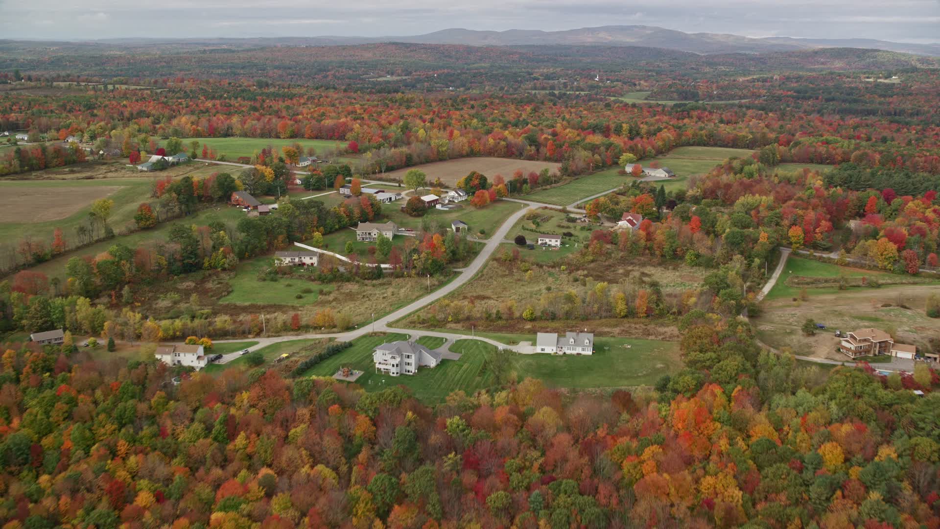 5.5K stock footage aerial video flying over colorful trees, approaching