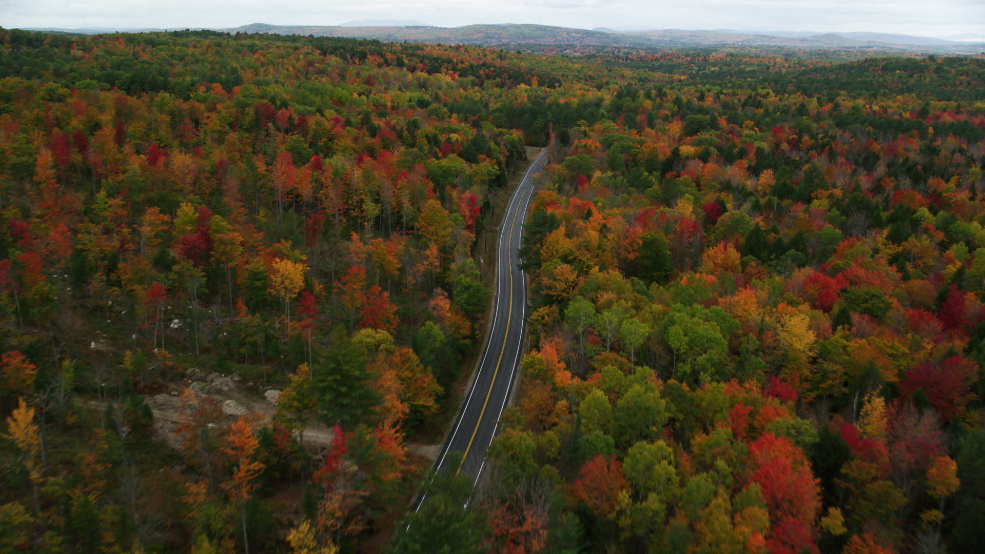 5.5K stock footage aerial video flying over Buckfield Road, brightly