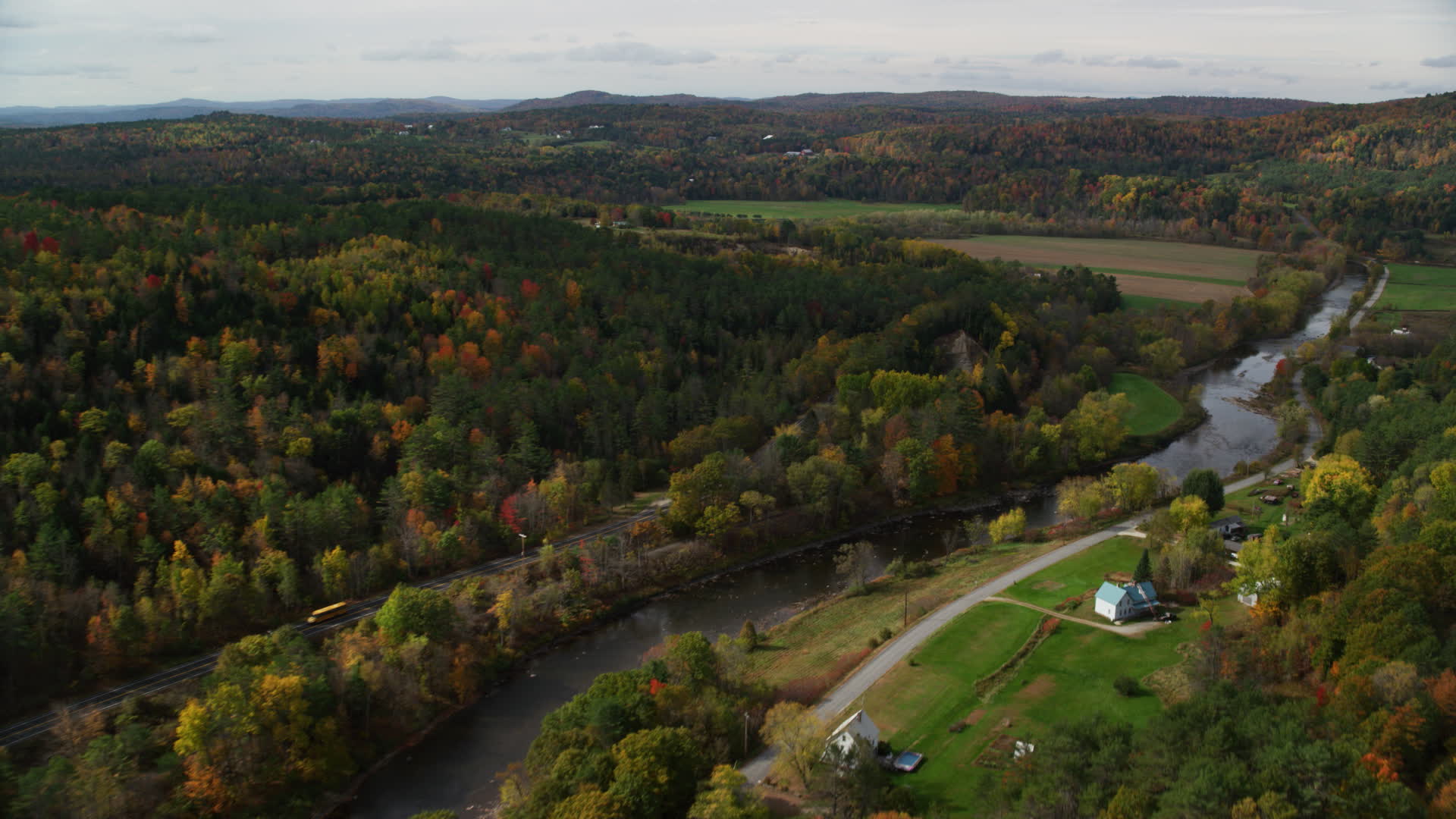 6K stock footage aerial video flying over rural homes, Ammonoosuc River