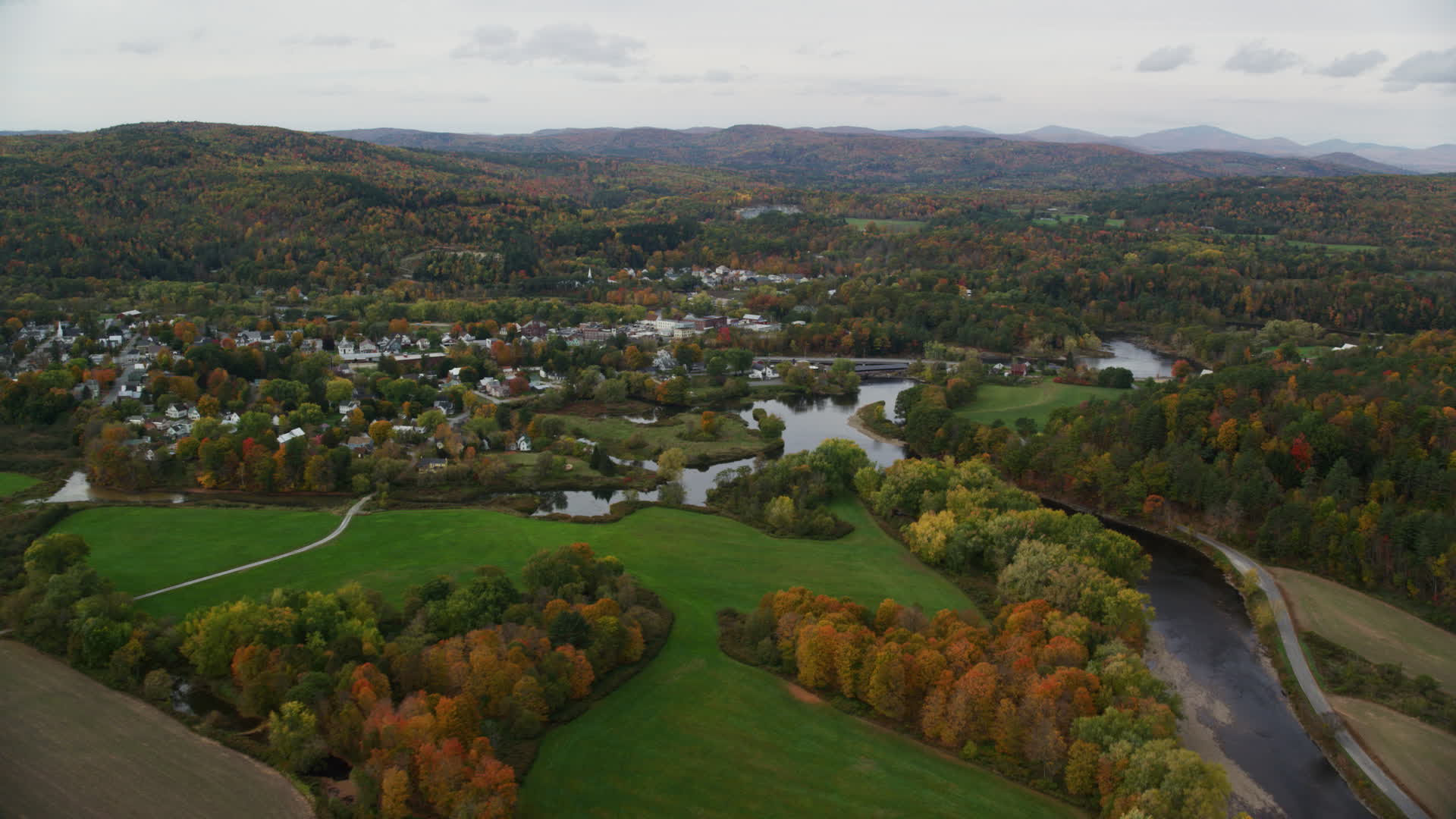 5.5K stock footage aerial video flying over Ammonoosuc River, approach