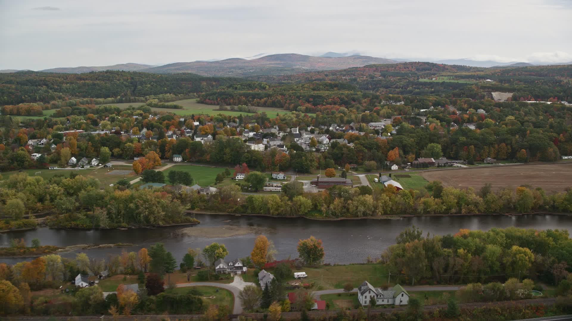 5.5K stock footage aerial video flying by small rural town, Connecticut