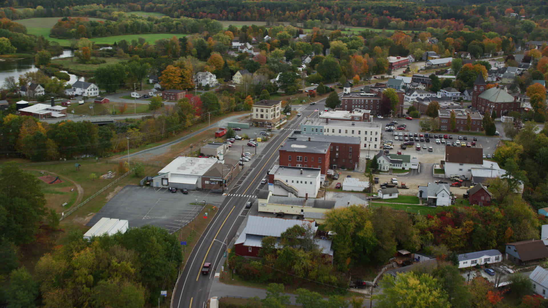 5.5K stock footage aerial video flying over Central Street through