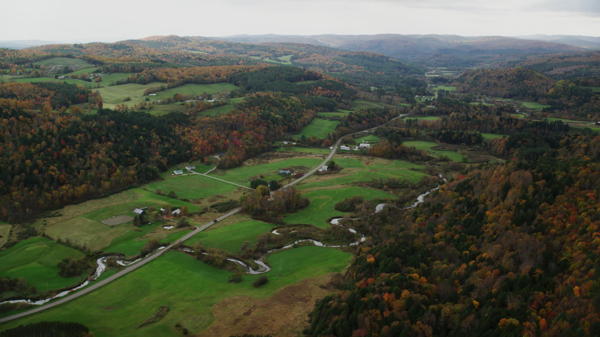 Flying by Route 14 through farms in autumn, overcast day, Bethel