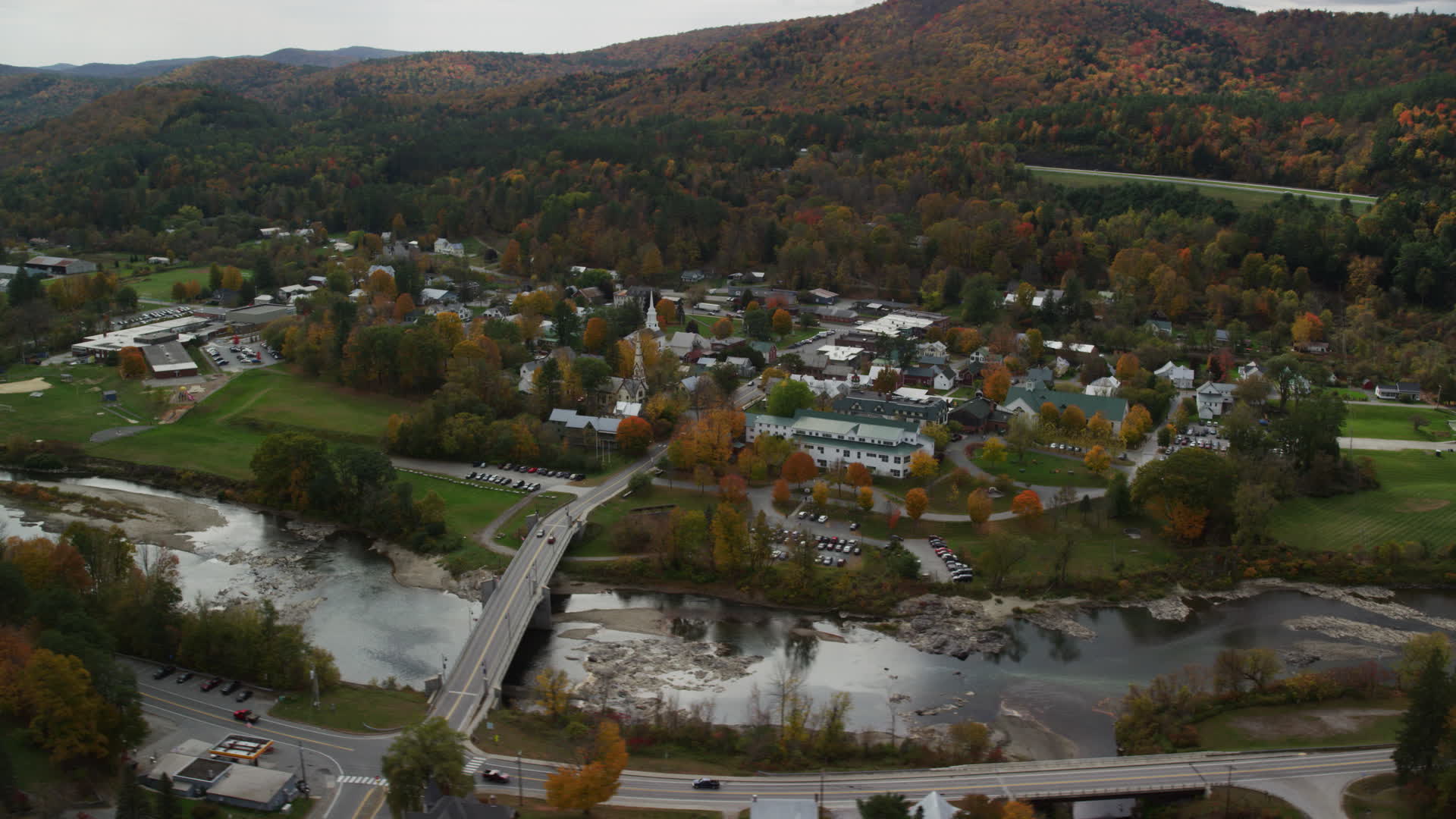 6K stock footage aerial video orbiting small bridge, White River, small