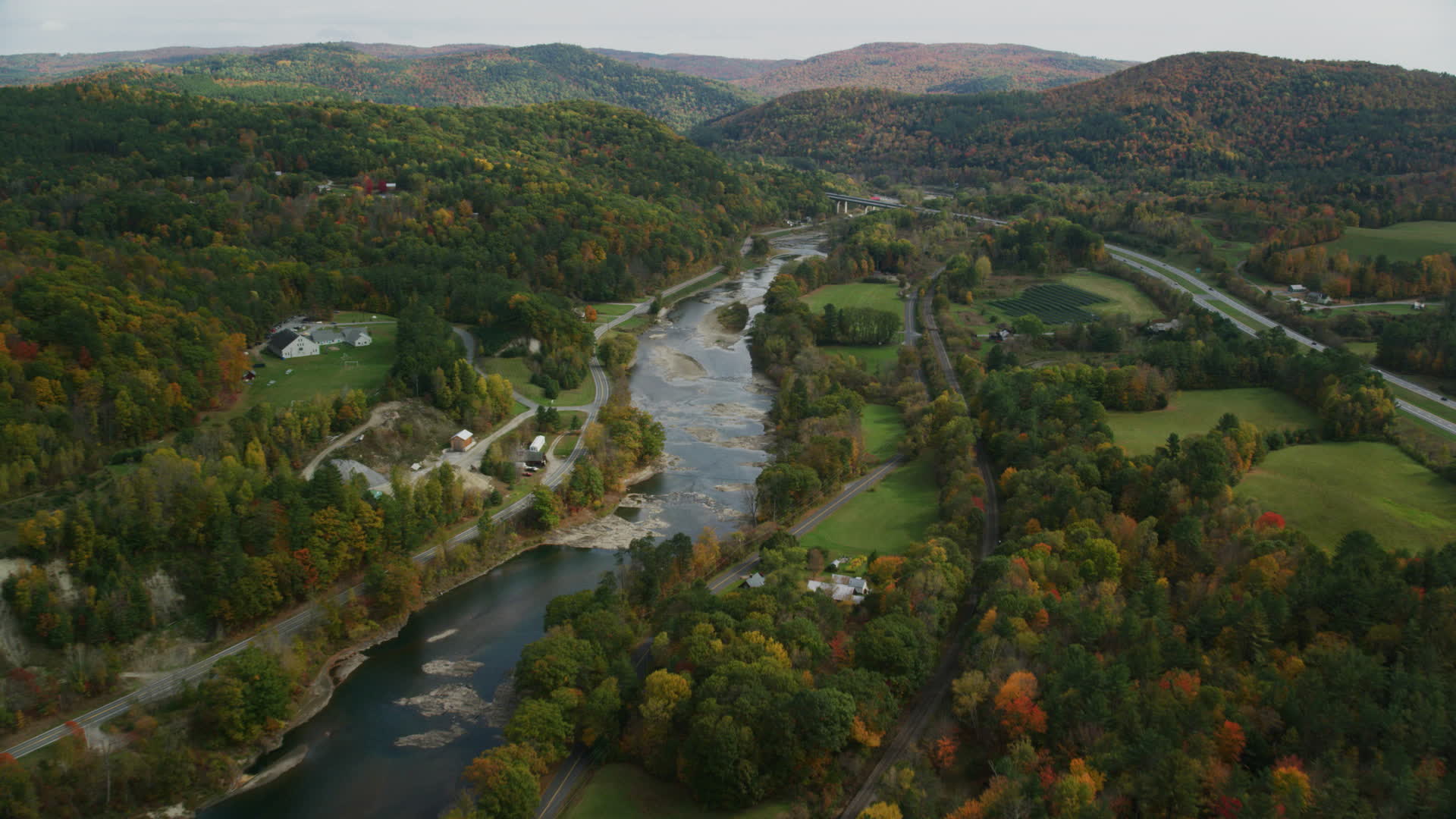 5.5K stock footage aerial video flying over country roads, approach White River, autumn, South