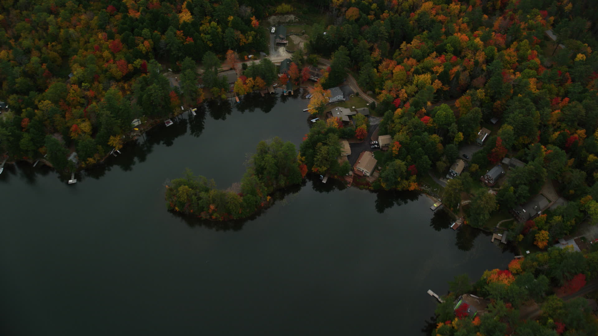6K stock footage aerial video of a bird's eye view over Perkins Pond
