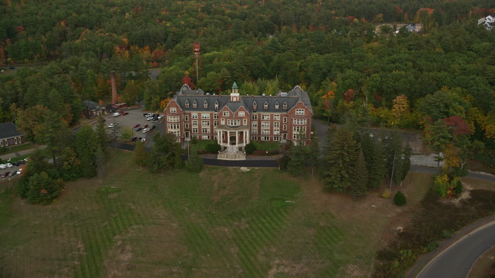 5.5K stock footage aerial video approaching, flying over Mercy Hall