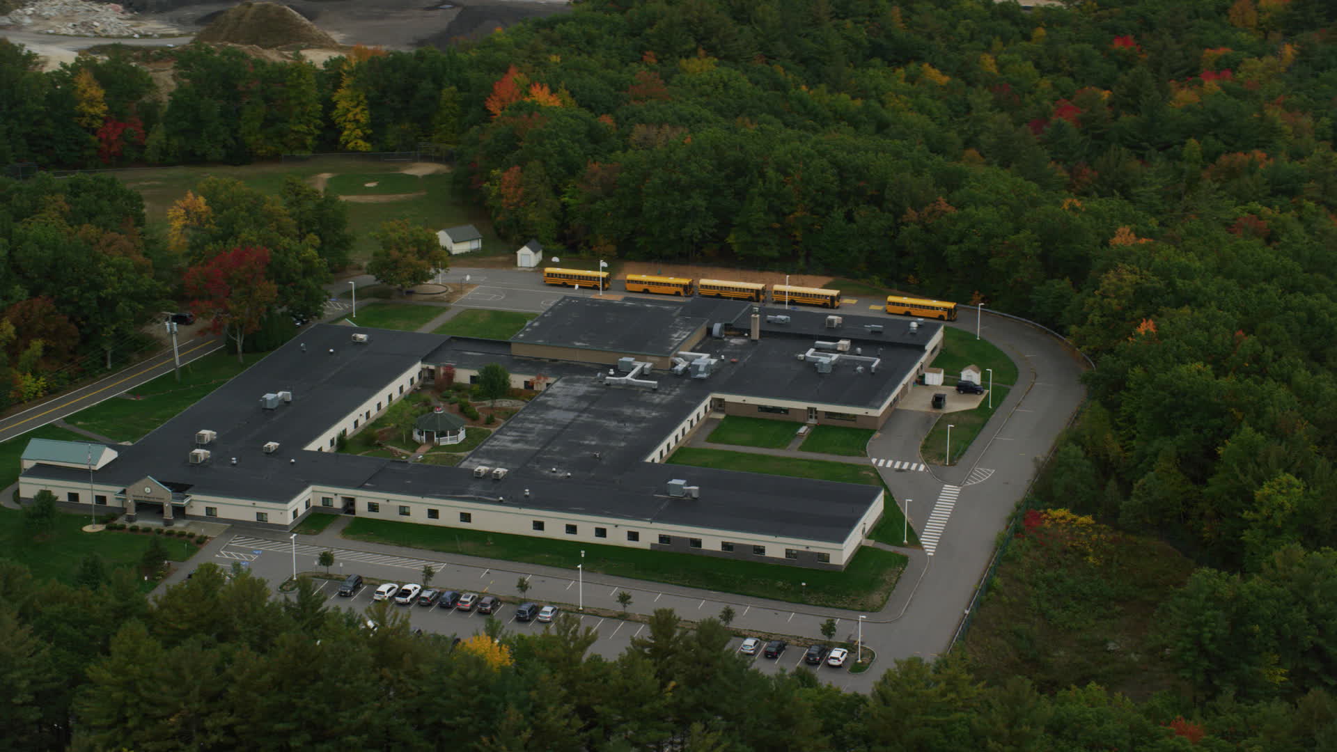5.5K stock footage aerial video orbiting Hooksett Memorial School