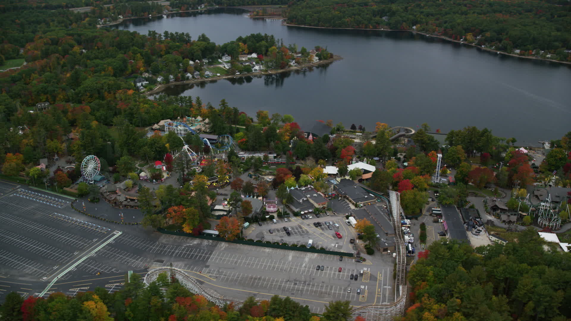 5.5K stock footage aerial video orbiting Canobie Lake Park, autumn