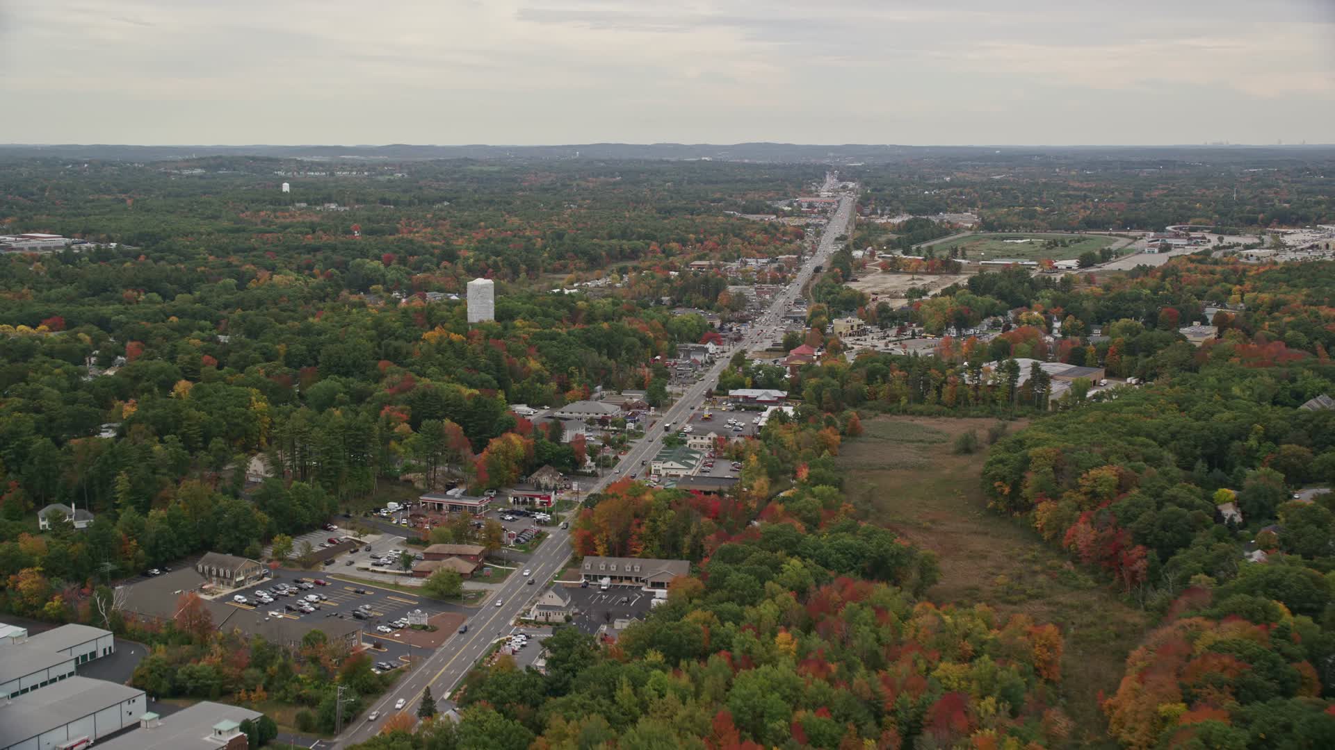 5.5K stock footage aerial video flying by shops, Broadway, colorful