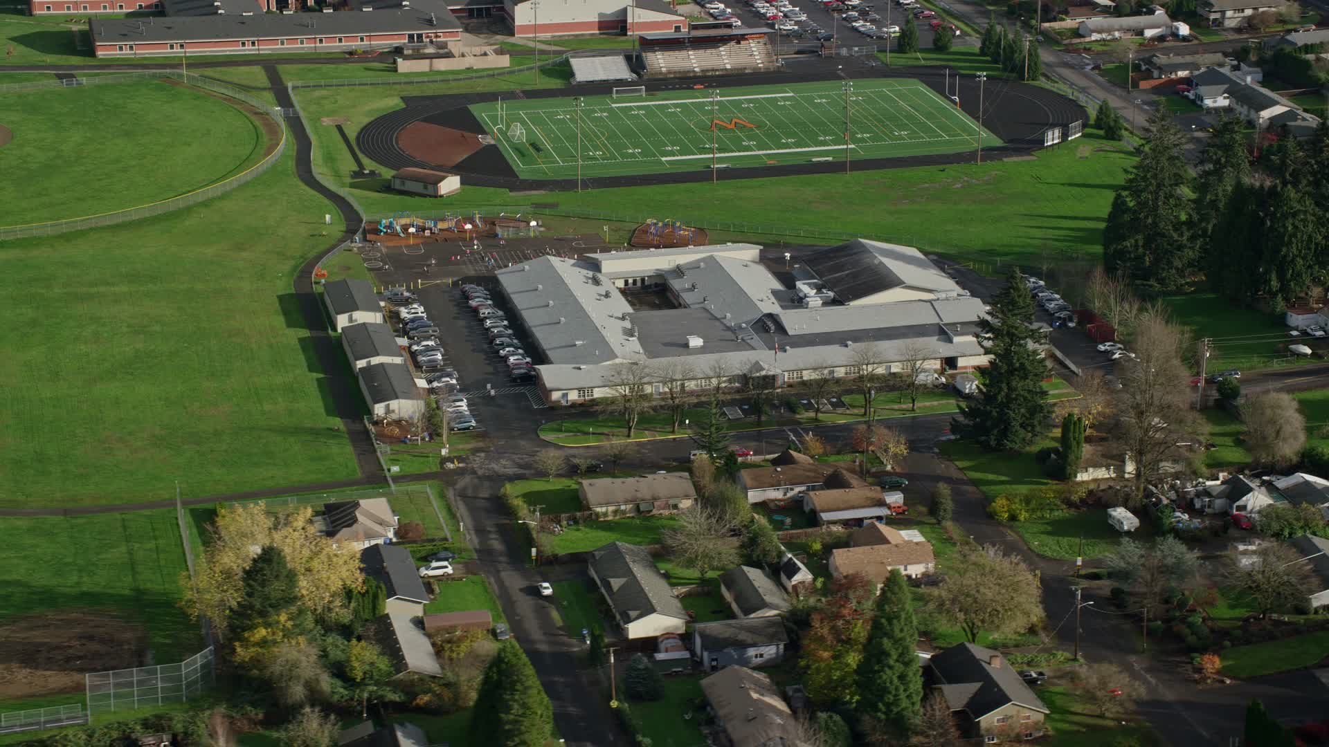5.5K stock footage aerial video orbiting Gause Elementary and the