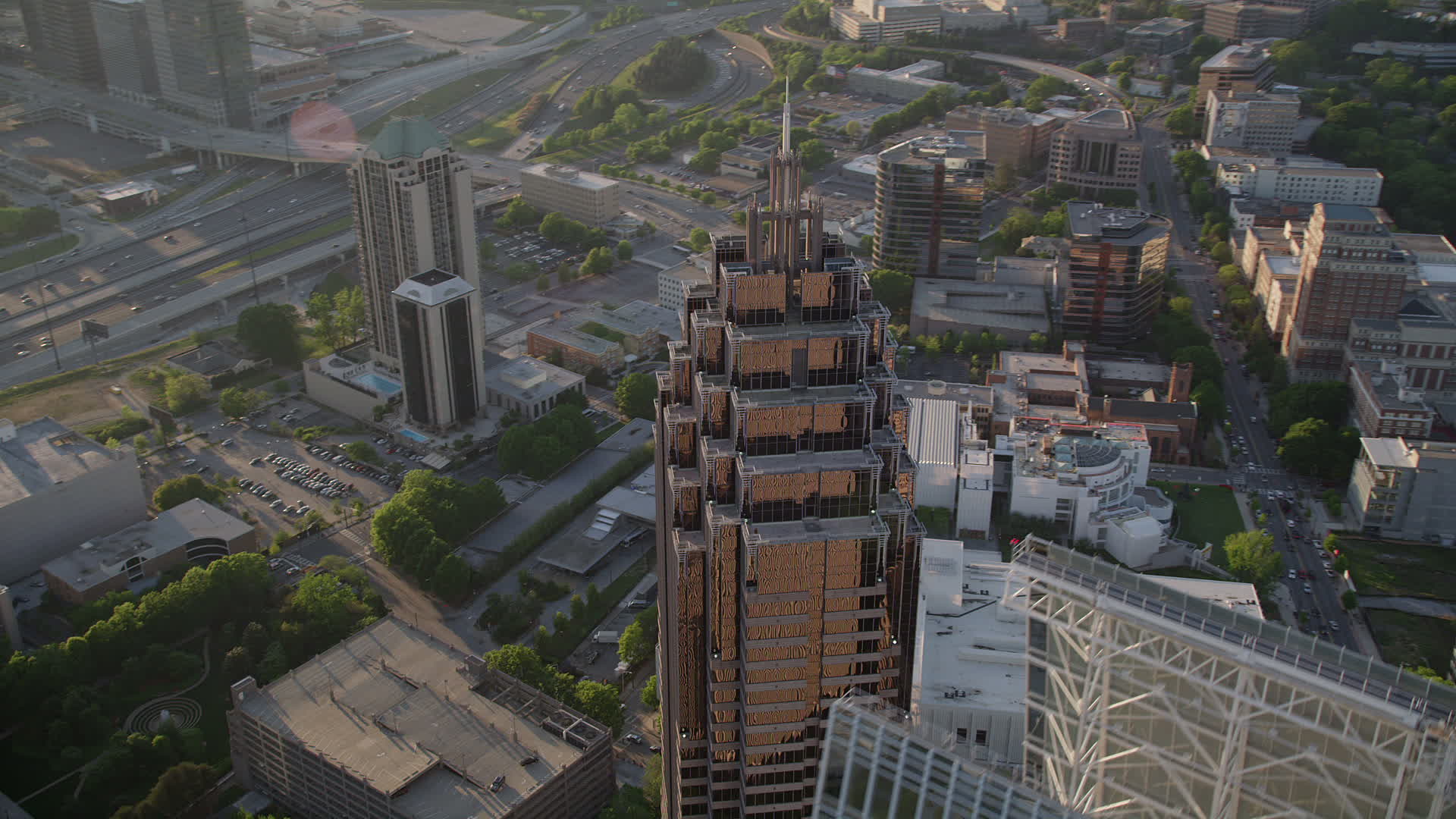 5K stock footage aerial video orbiting the top of Promenade II, Midtown