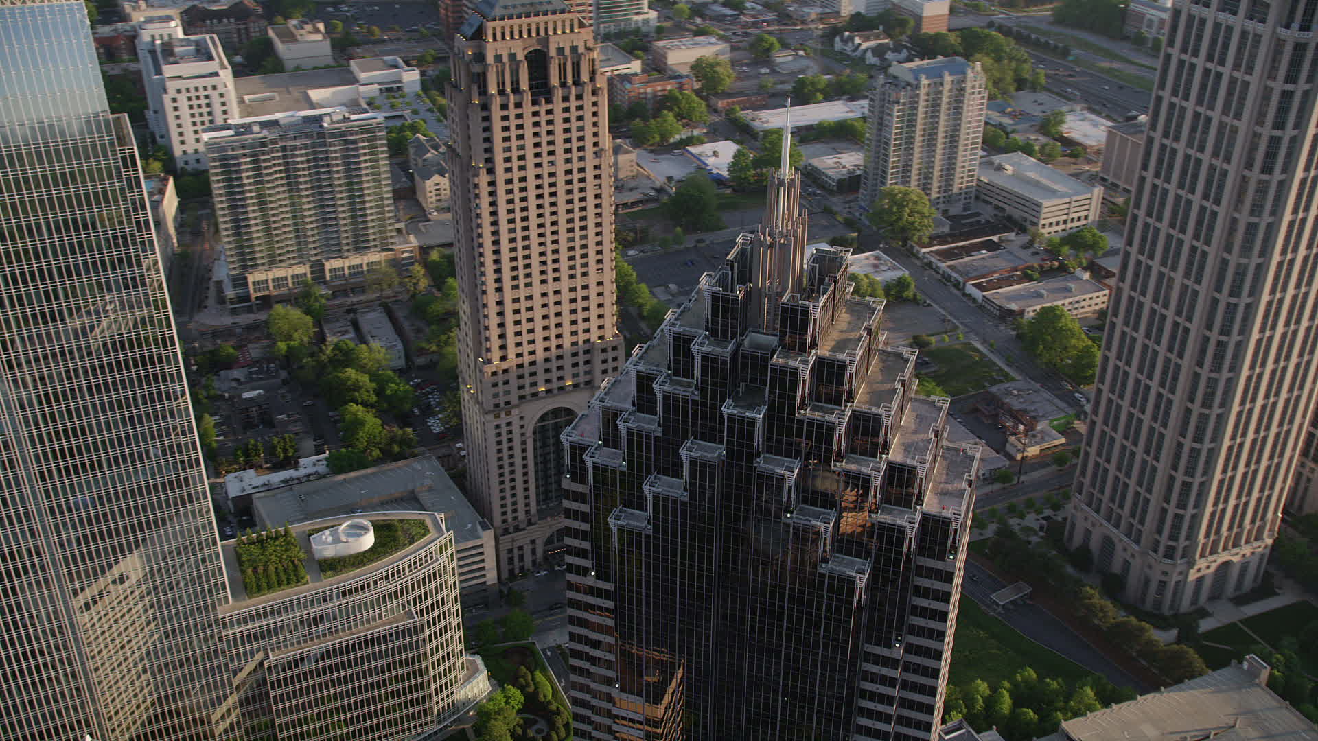 5K stock footage aerial video orbiting top of Promenade II, Midtown