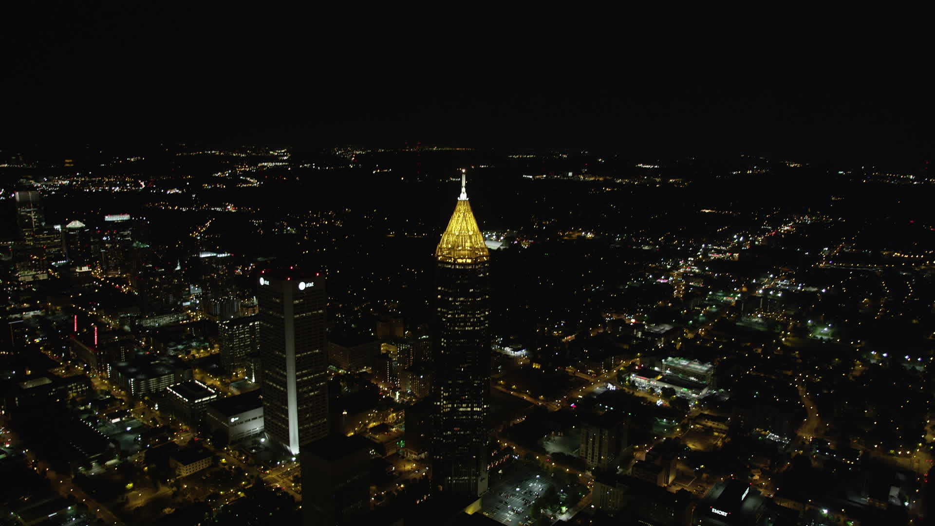 5K stock footage aerial video tilting down from black sky to Bank of