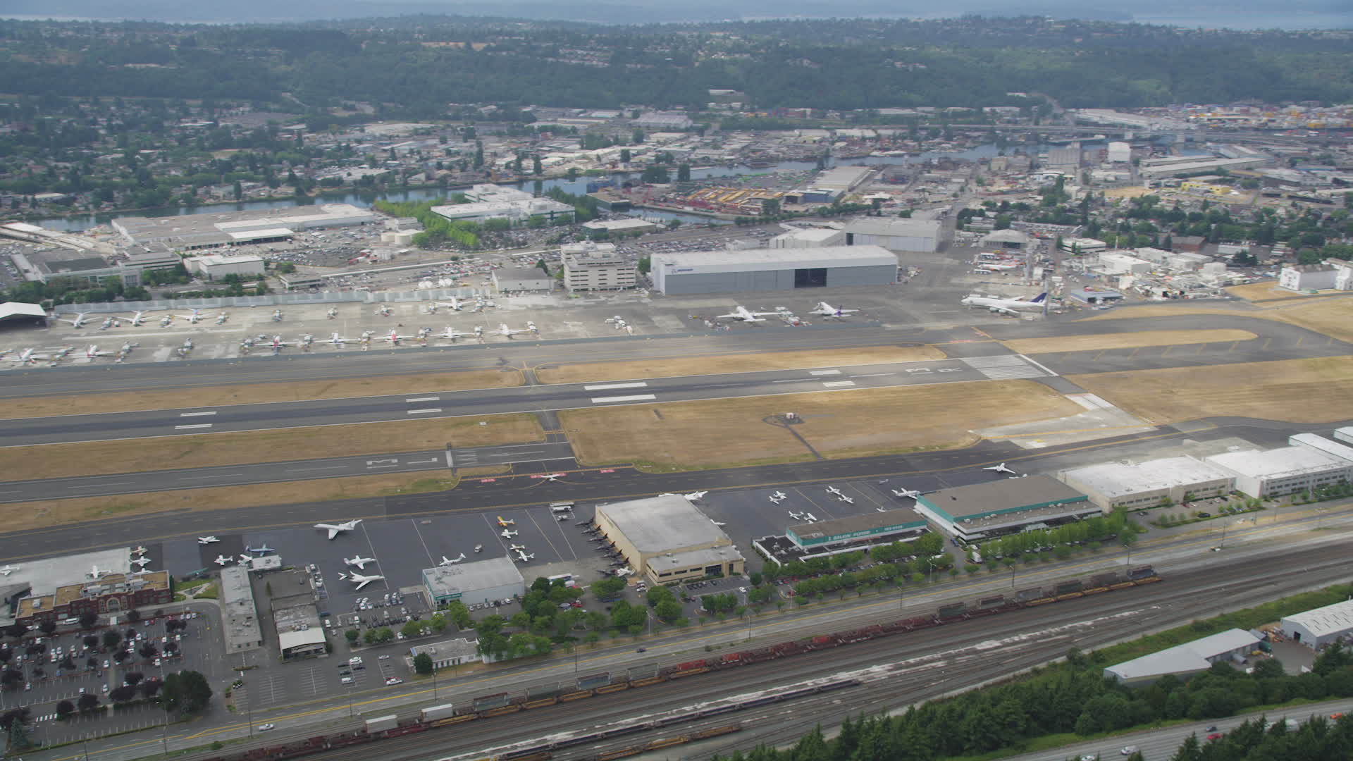 5K stock footage aerial video of parked commercial jets at Boeing Field