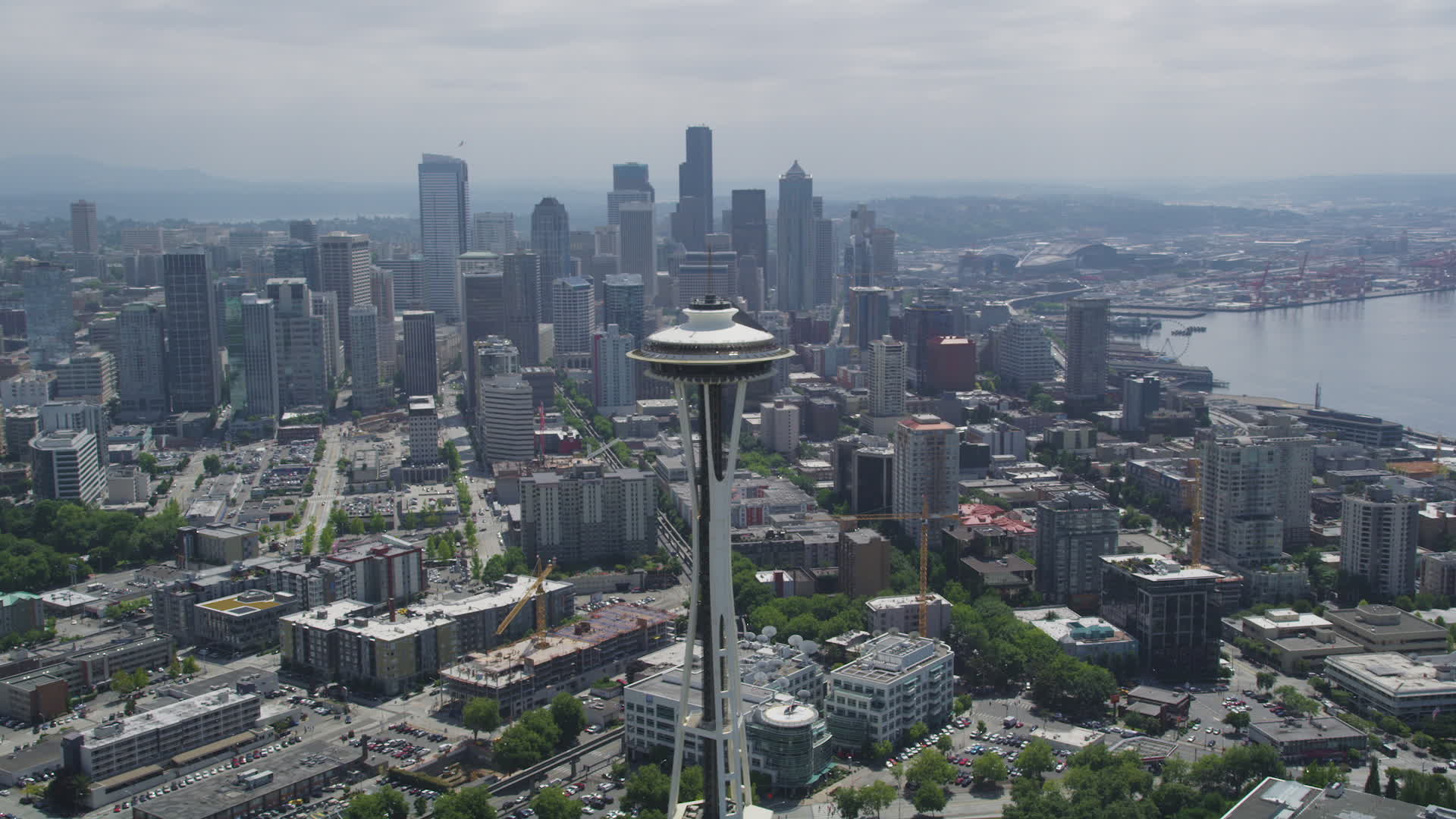 5k stock footage aerial video flying by space needle and focus on the downtown seattle skyline washington aerial stock footage ax45_056 axiom seattle city scape