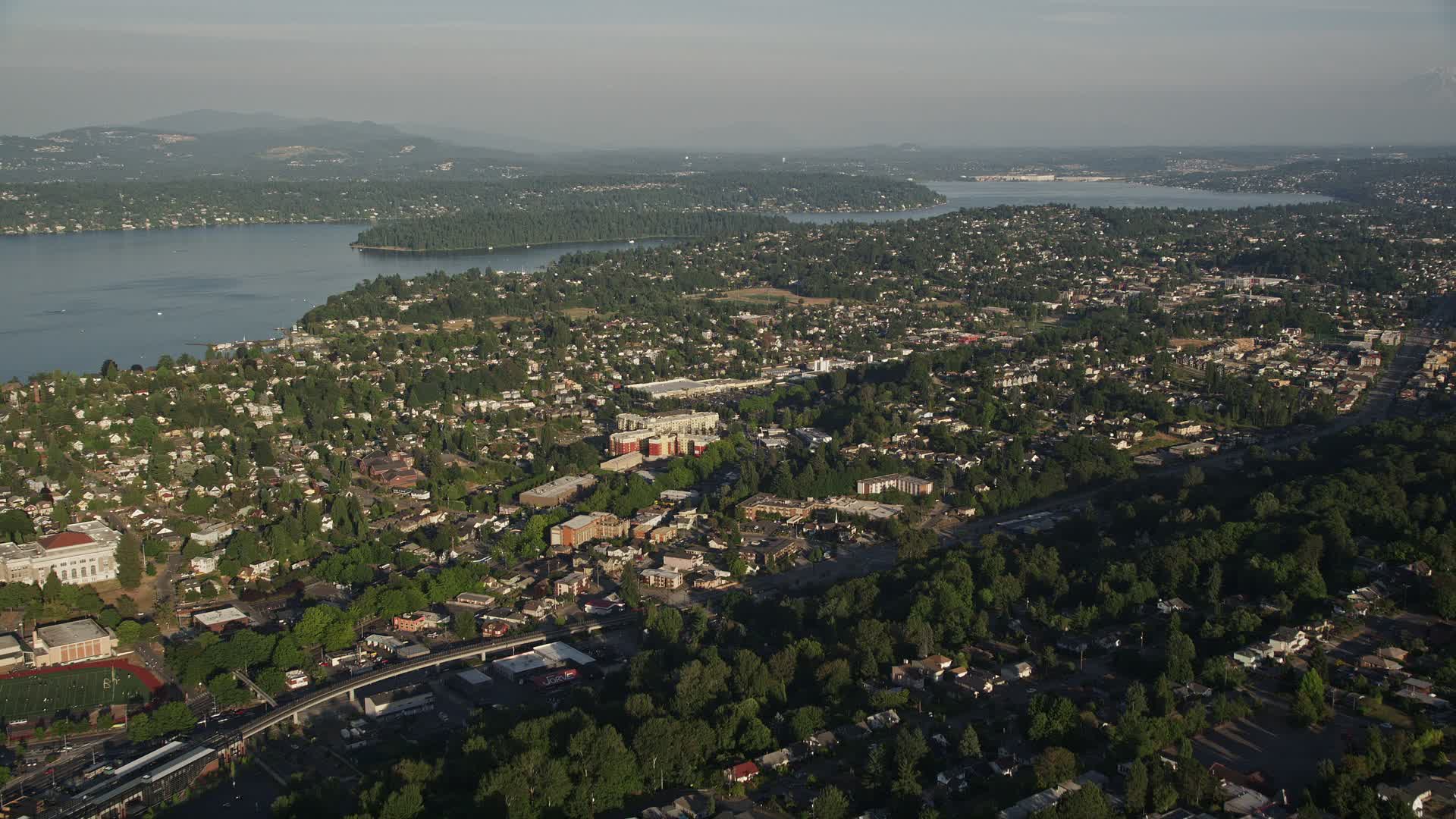 5K stock footage aerial video of suburbs in Rainier Valley, Seattle, Washington, and approach