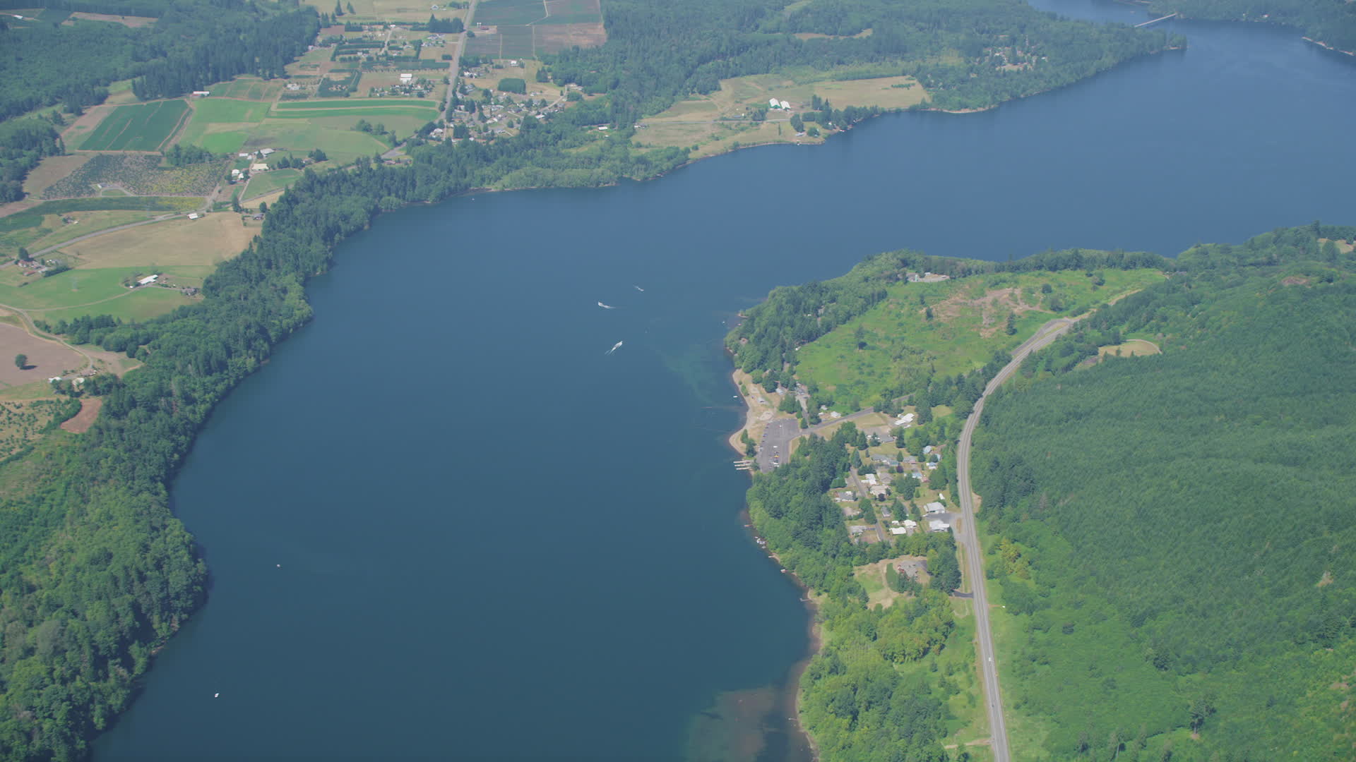 5K stock footage aerial video of reverse view of boats in Mayfield Lake