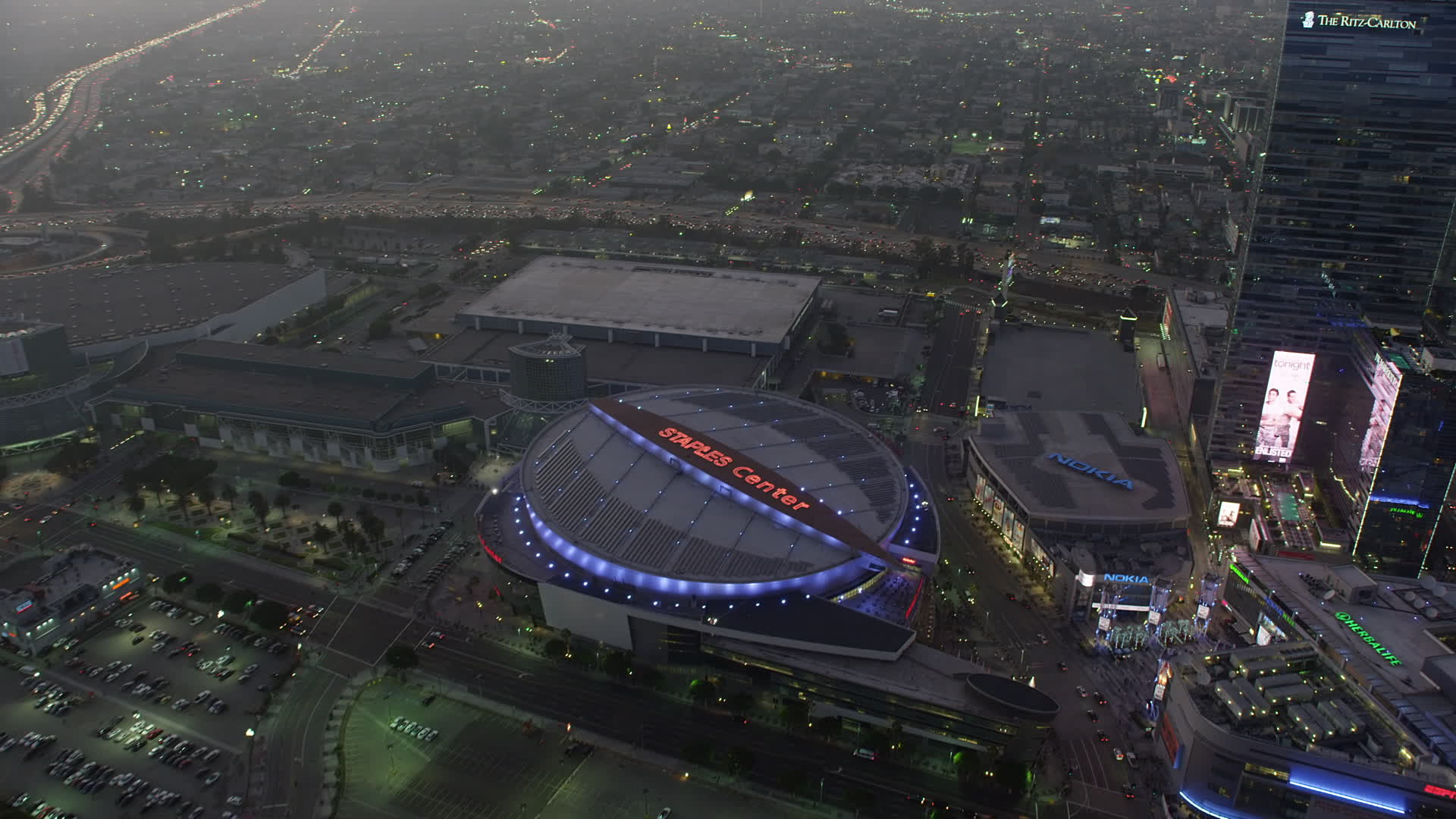 5K stock footage aerial video of Staples Center arena and The RitzCarlton hotel, Downtown Los