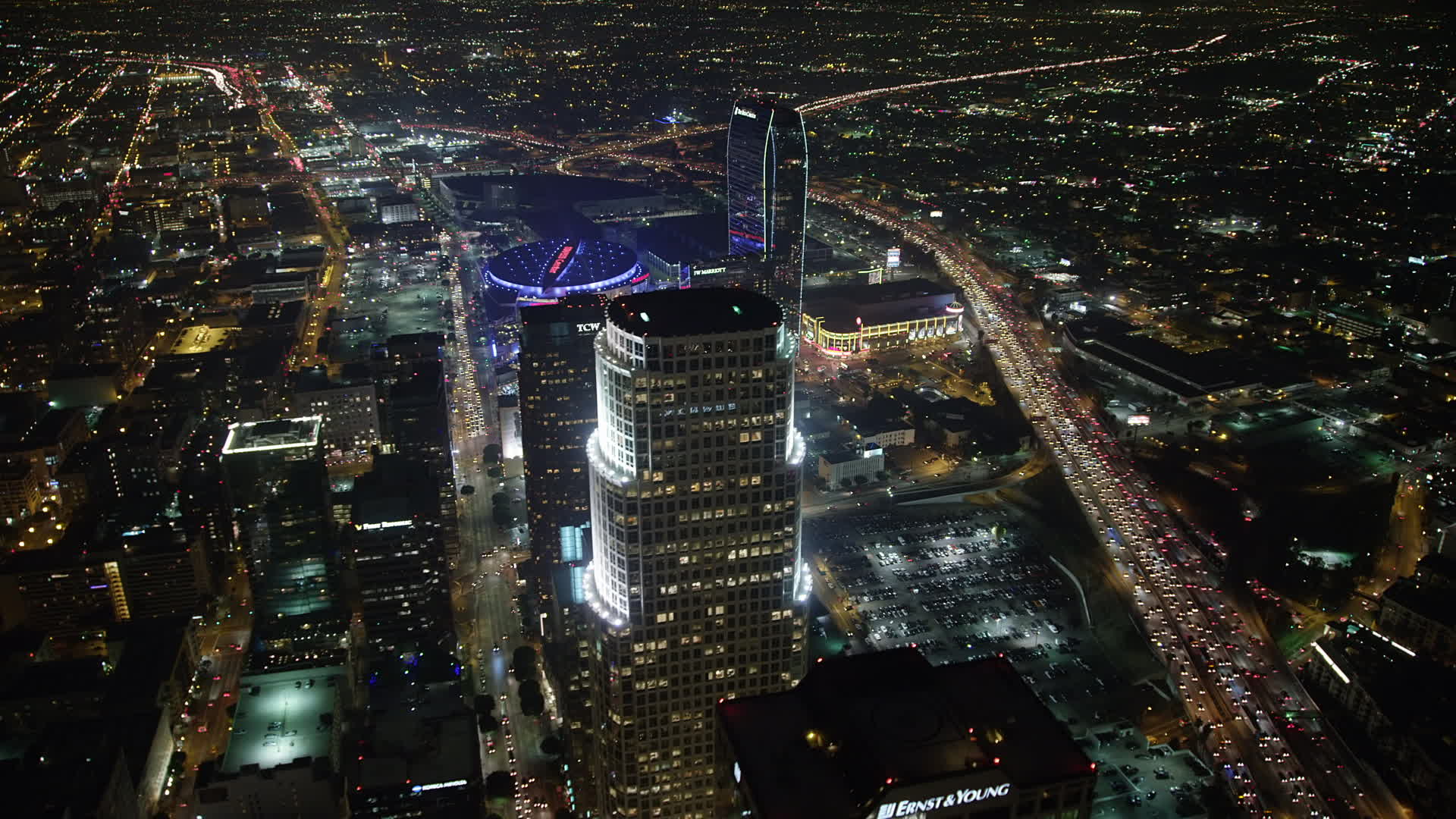 5K stock footage aerial video of 777 Tower, Staples Center, and The RitzCarlton Hotel, Downtown