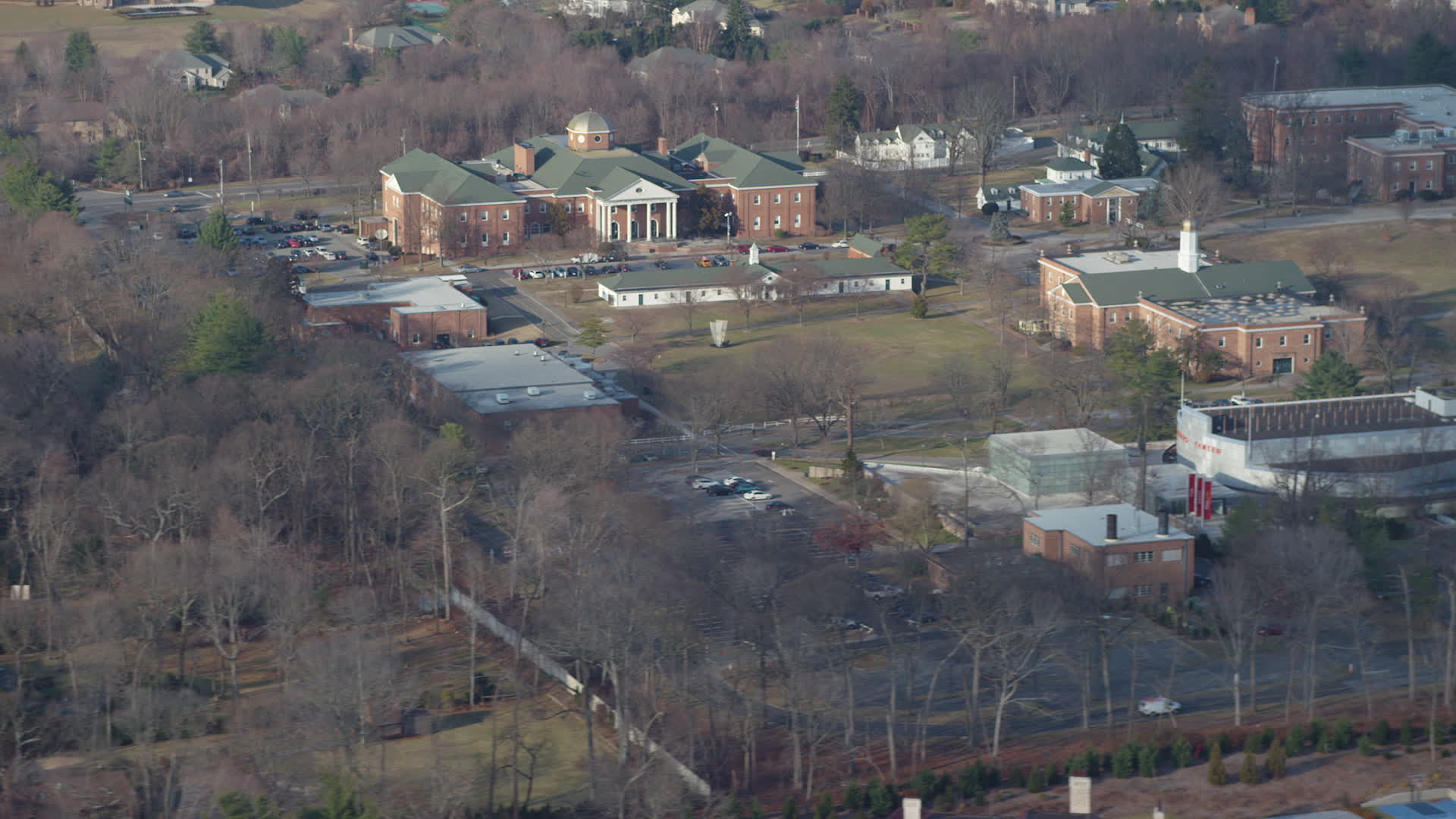 5K stock footage aerial video of a library and campus buildings at LIU