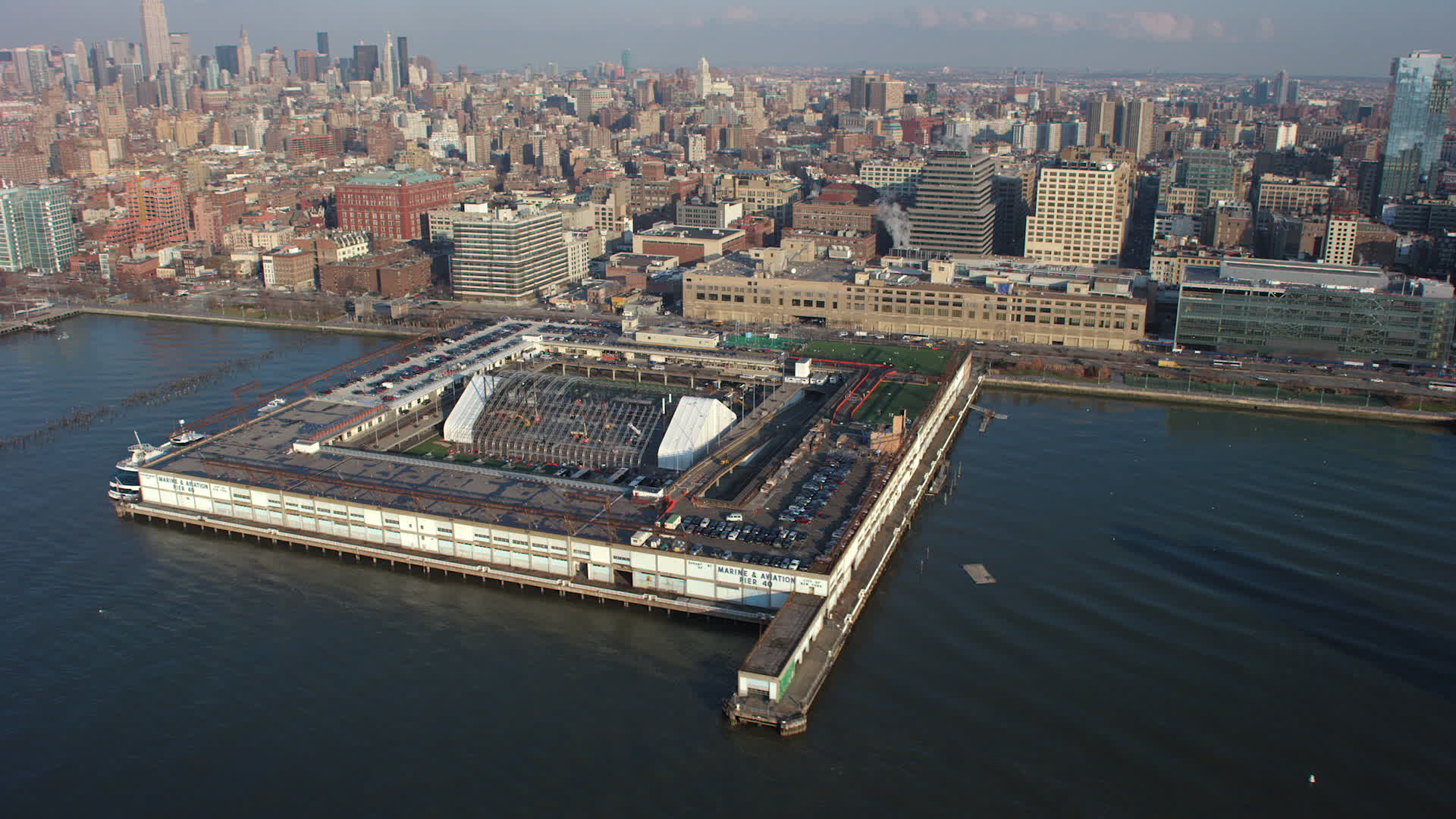 5K stock footage aerial video approach Pier 40 at Hudson River Park in Greenwich Village, New 5K stock footage aerial video approach Pier 40 at Hudson River Park in Greenwich Village, New