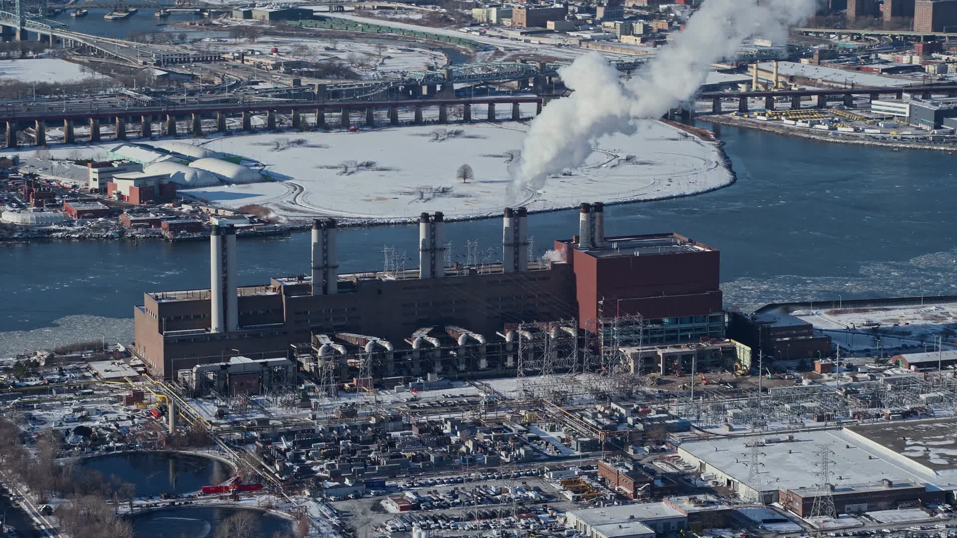 4.8K stock footage aerial video of a power plant in winter in Queens