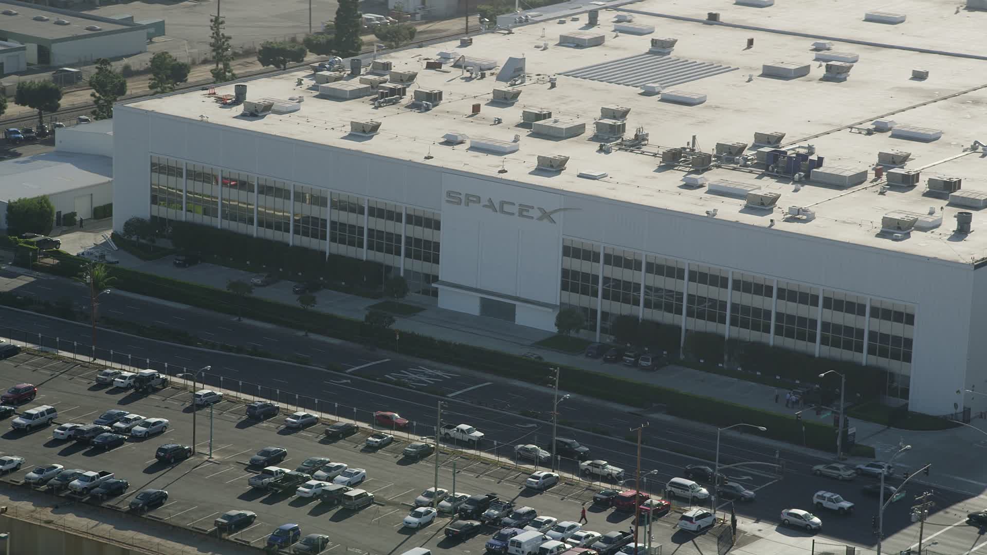 5K stock footage aerial video front of SpaceX office building in