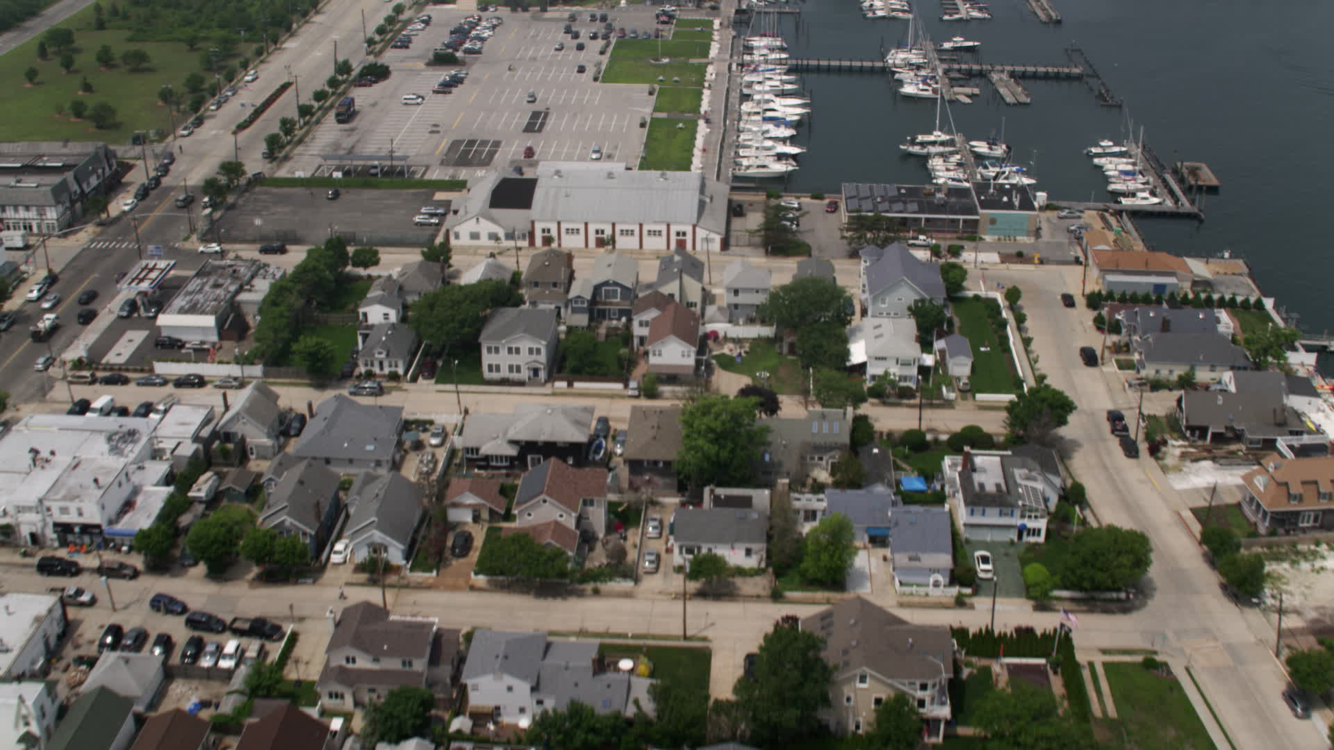 5K stock footage aerial video flying over small marina, Loop Parkway in