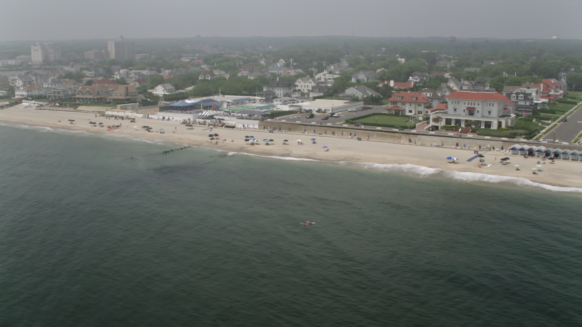5K stock footage aerial video of upscale oceanfront homes and Allenhurst Beach Club in